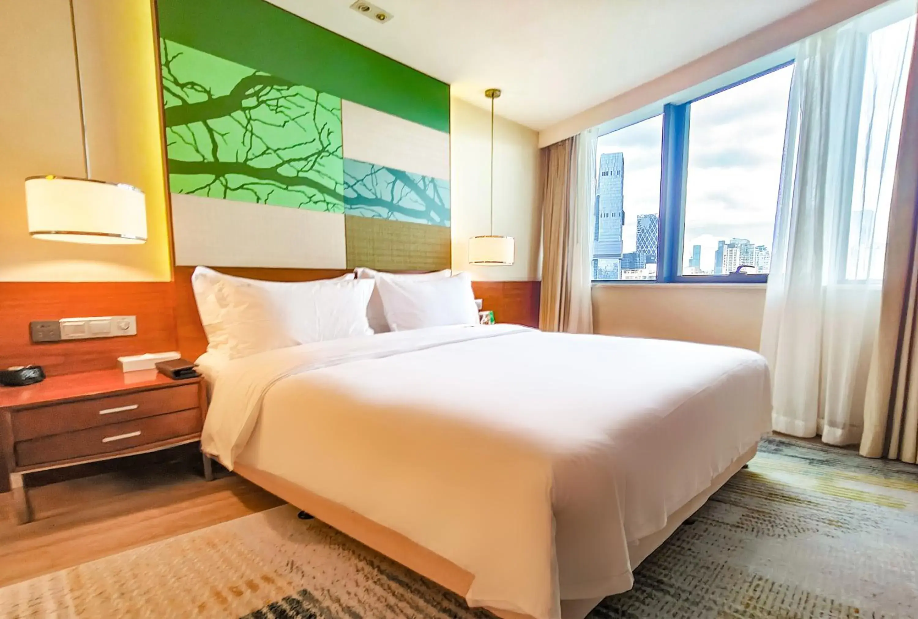 Bed in Holiday Inn Shenzhen Donghua by IHG Bed in Holiday Inn Shenzhen Donghua by IHG