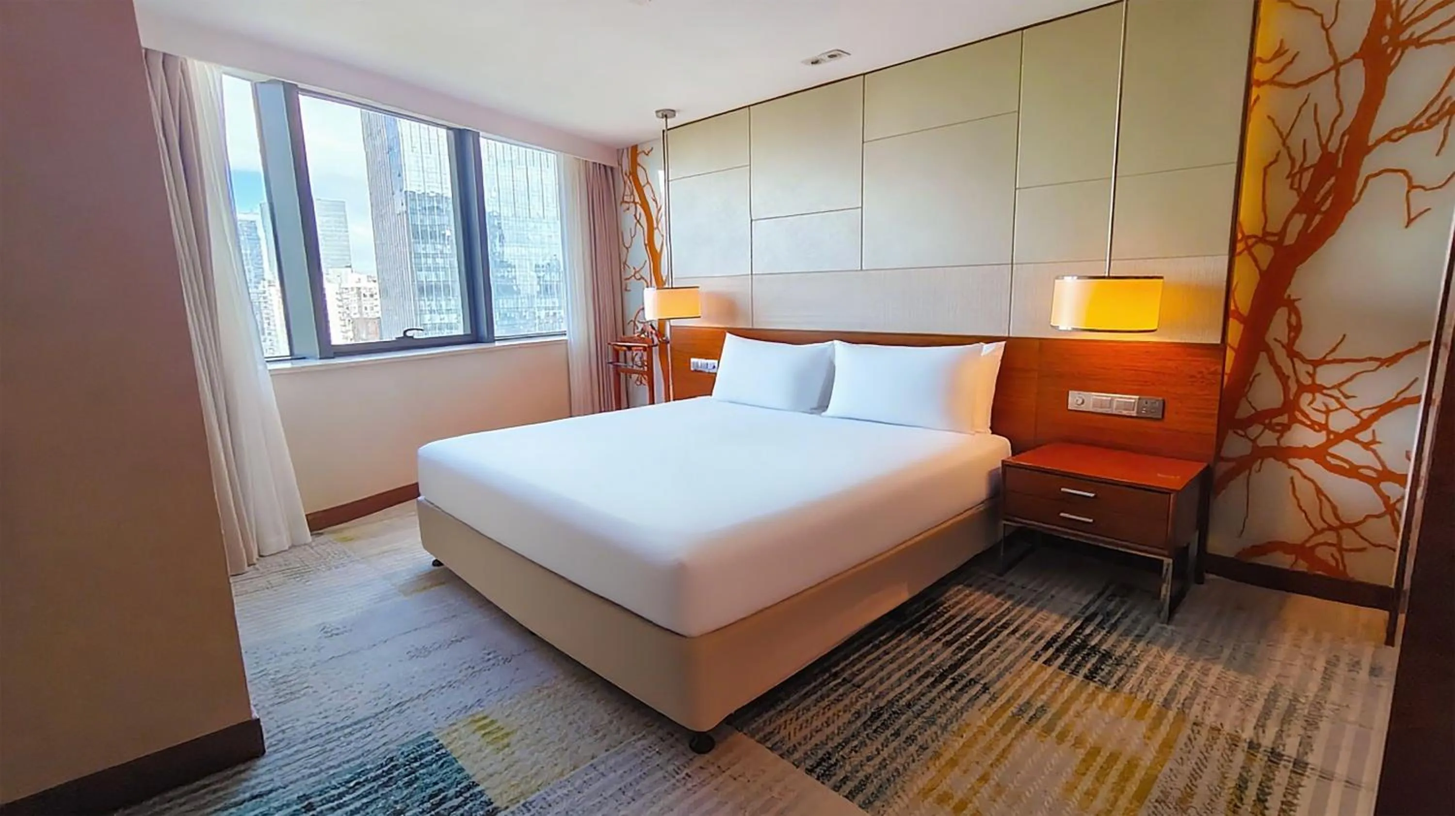 Bed in Holiday Inn Shenzhen Donghua by IHG