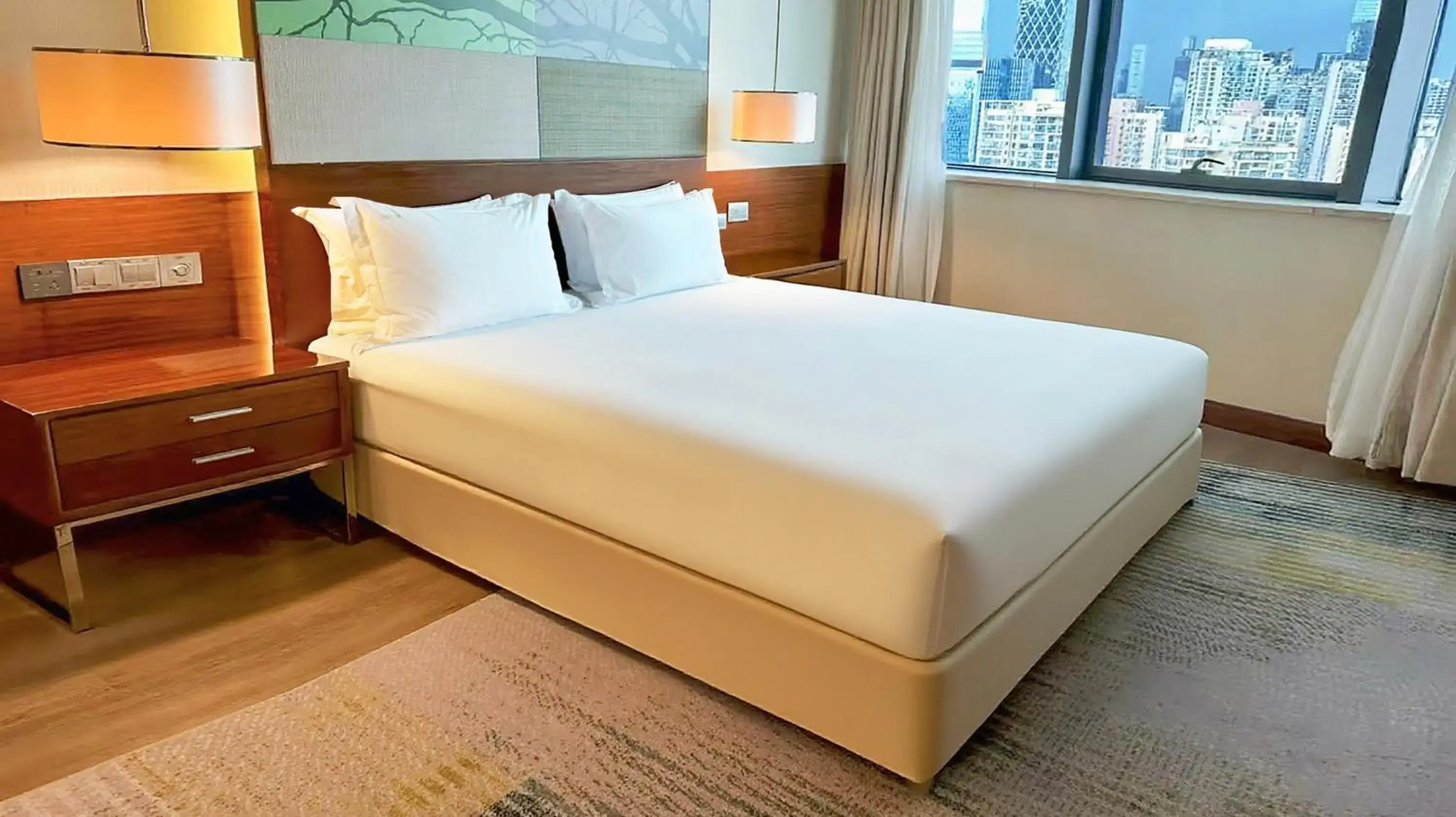 Bed in Holiday Inn Shenzhen Donghua by IHG Bed in Holiday Inn Shenzhen Donghua by IHG