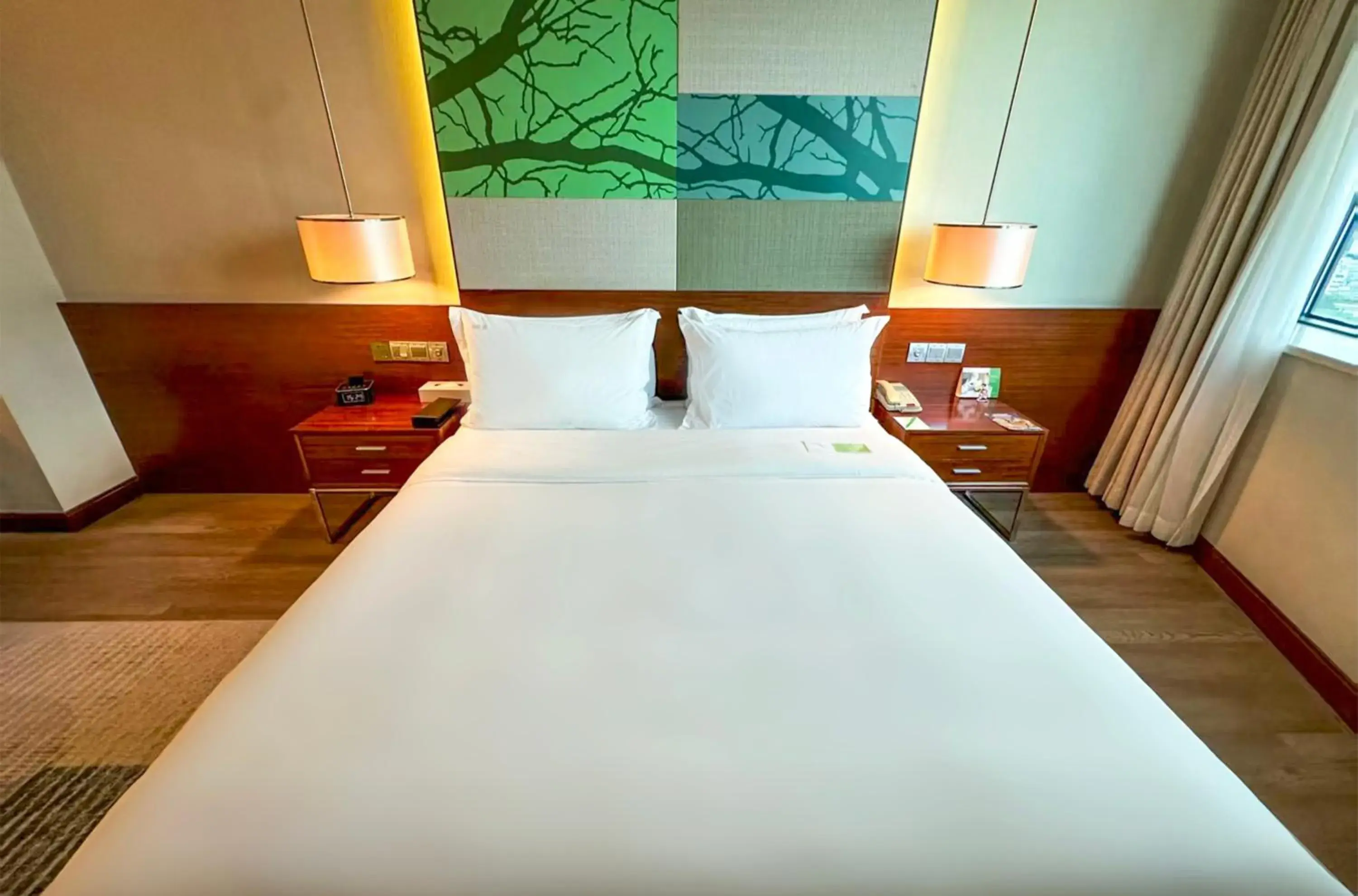 Bed in Holiday Inn Shenzhen Donghua by IHG Bed in Holiday Inn Shenzhen Donghua by IHG