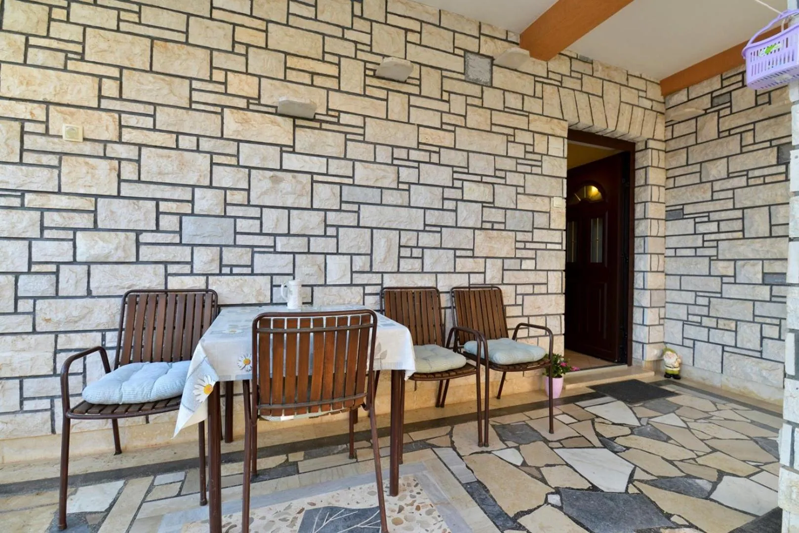 Seating area in ALEKS house with apartments
