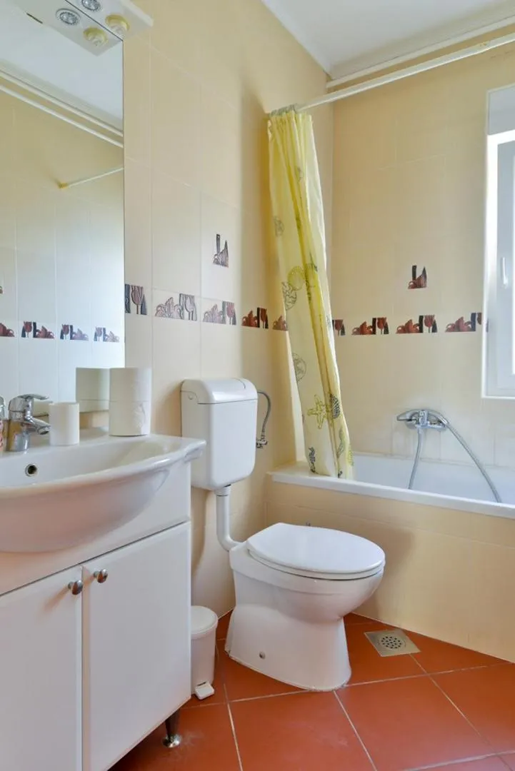 Bathroom in ALEKS house with apartments