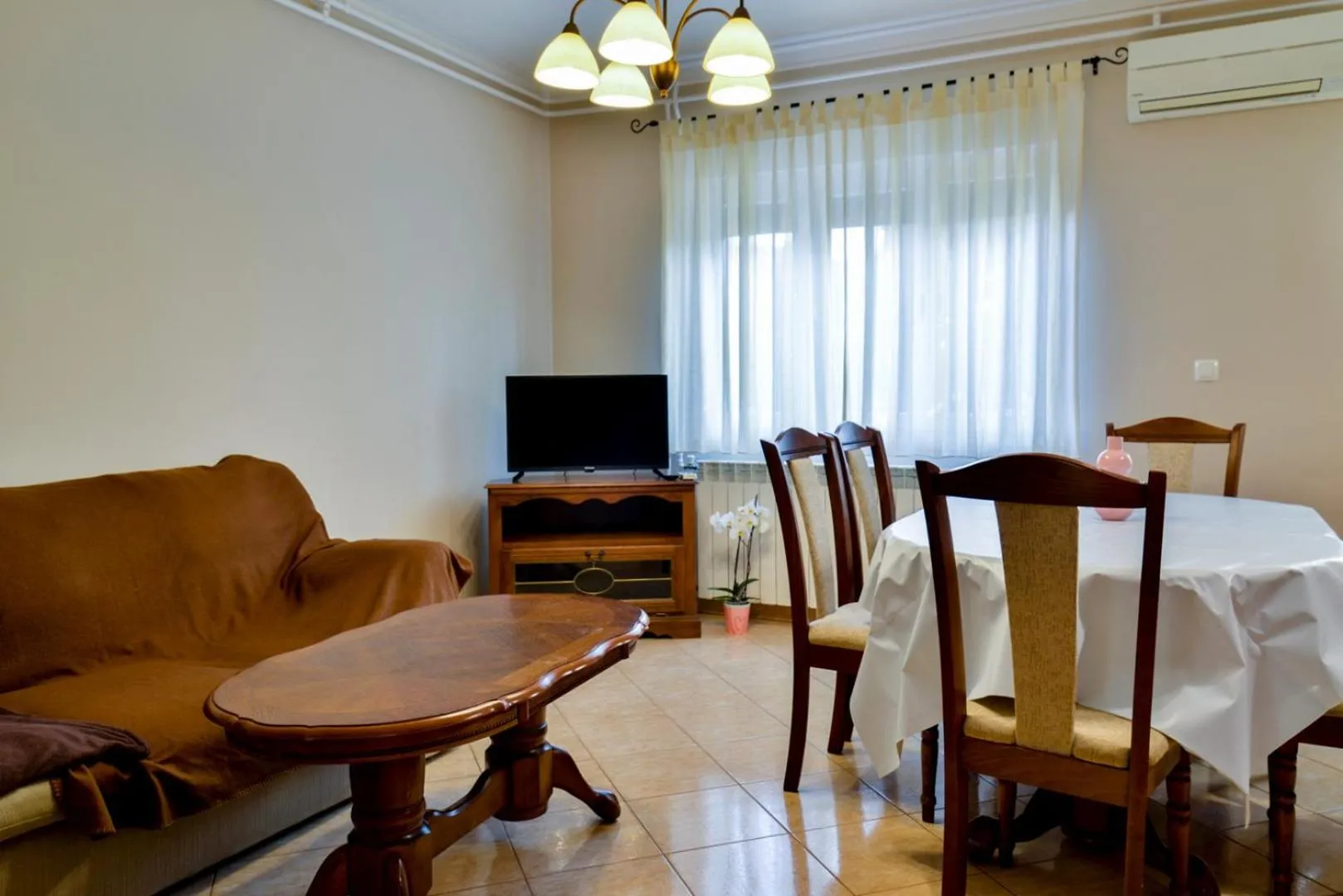 TV and multimedia in ALEKS house with apartments