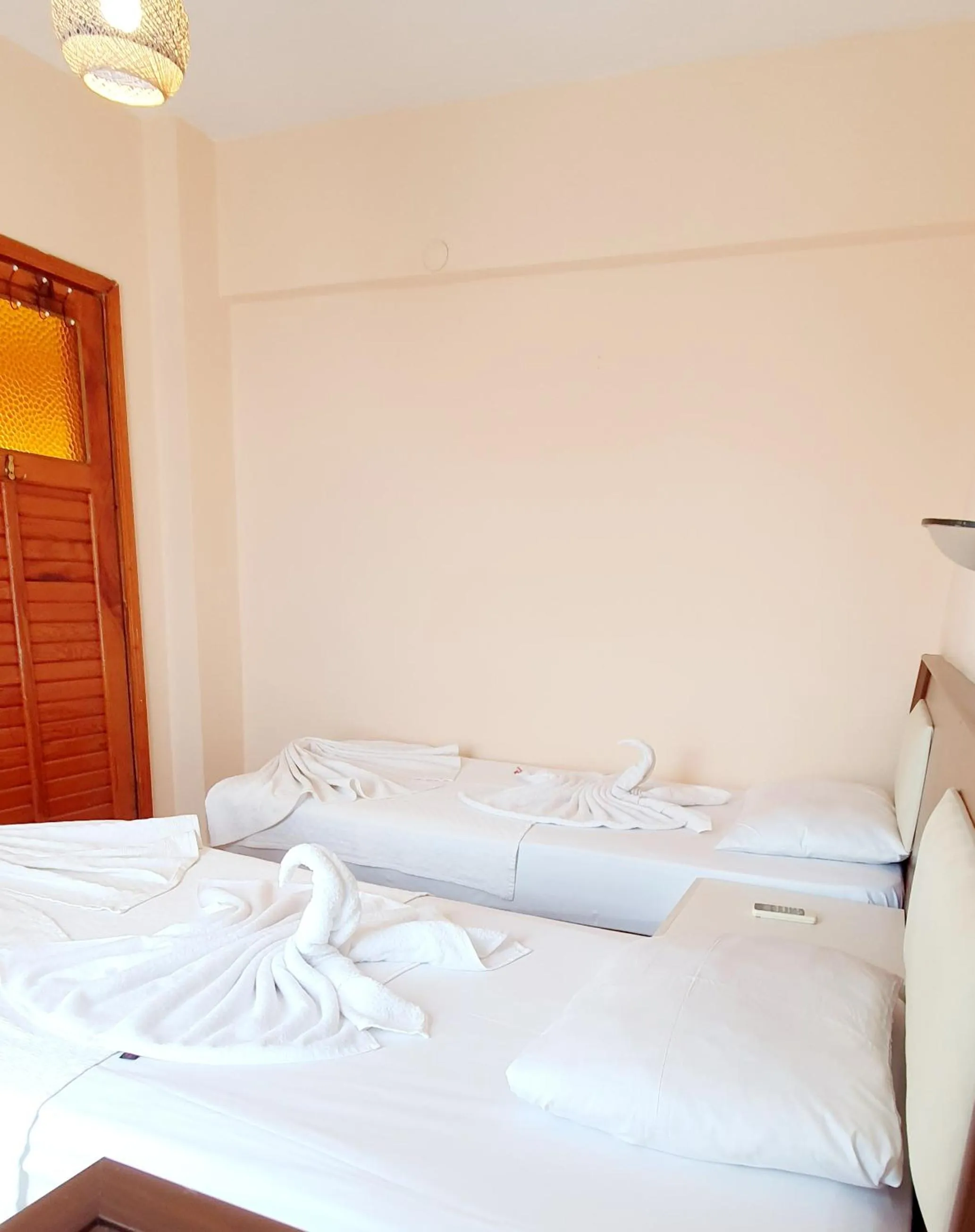 Bed in Palmen Apart Hotel