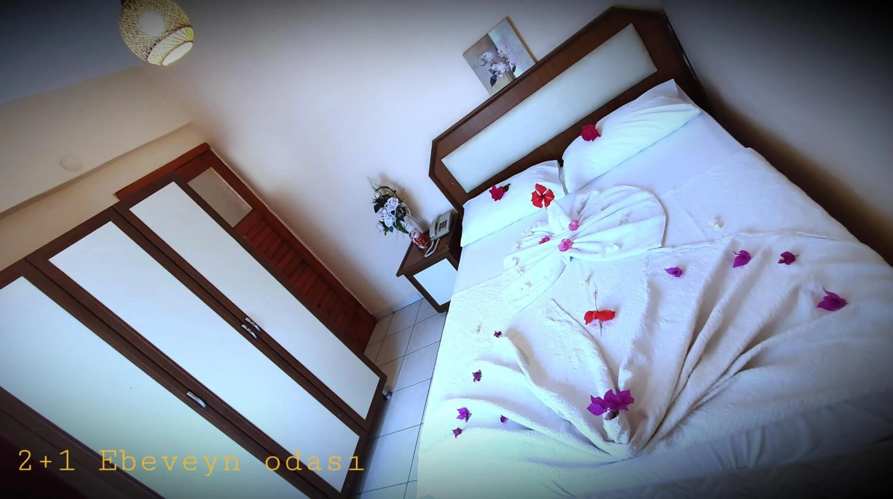 Bed in Palmen Apart Hotel