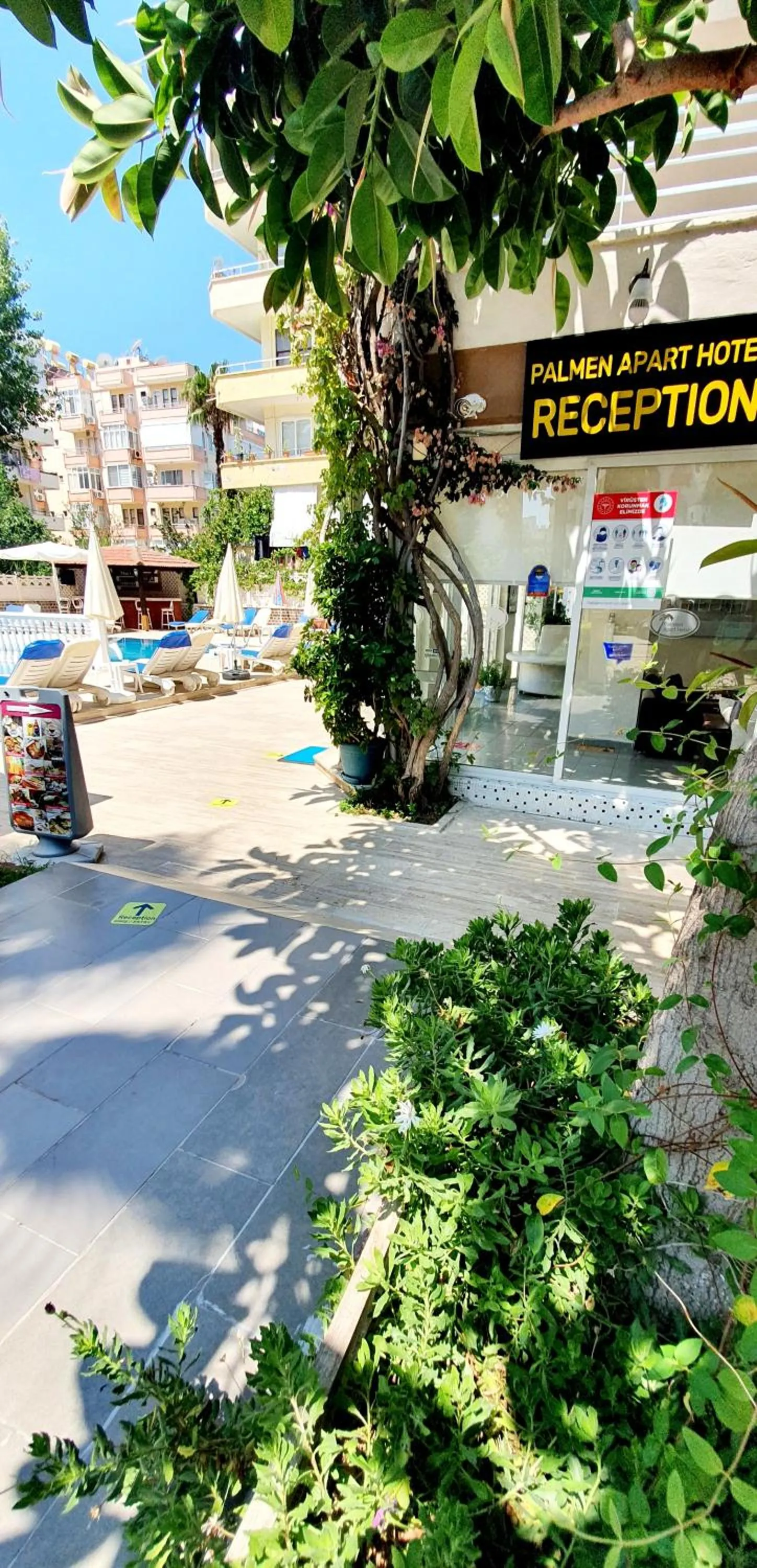 Property logo or sign in Palmen Apart Hotel