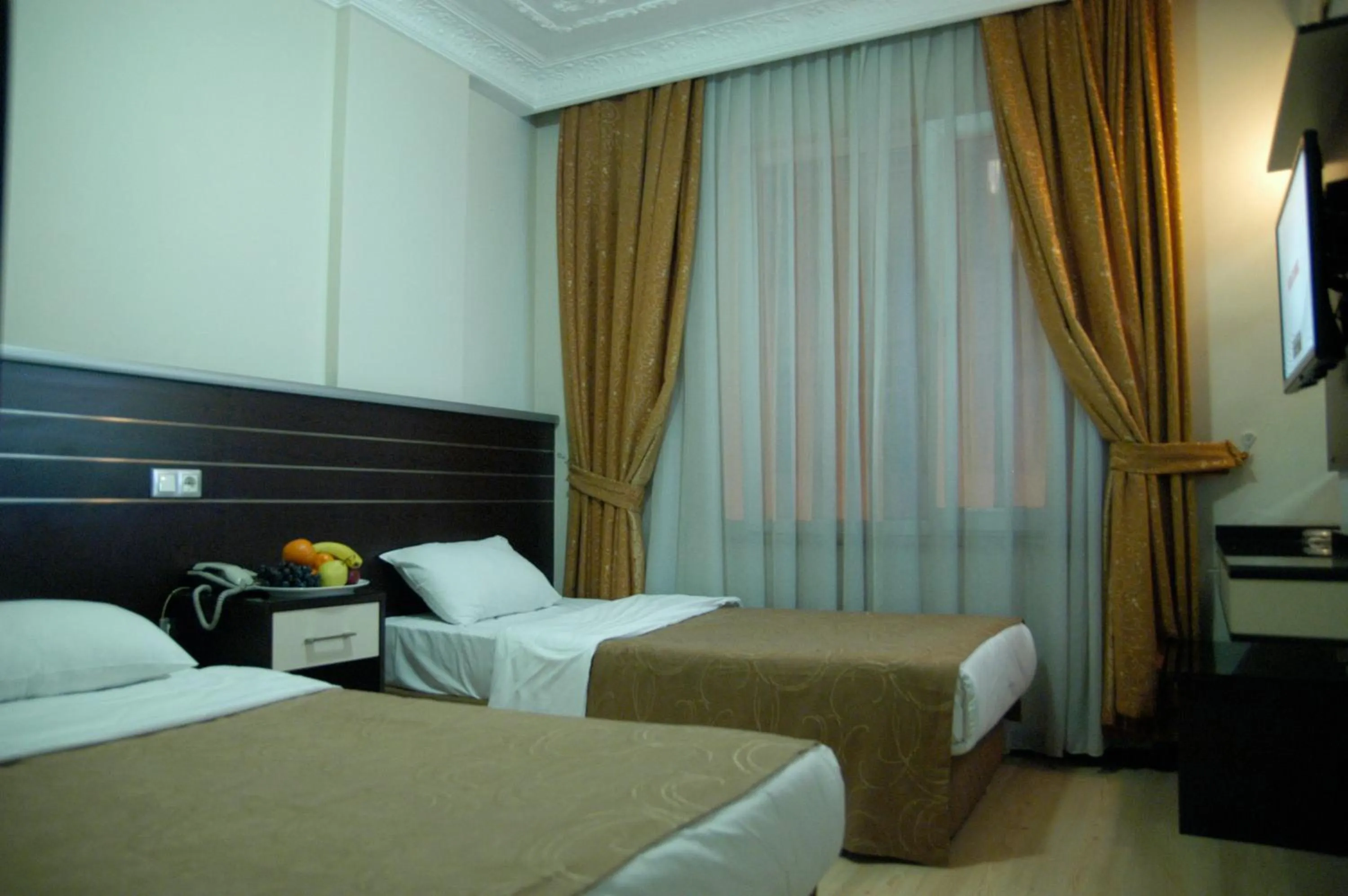 Bed in Merdan Hotel