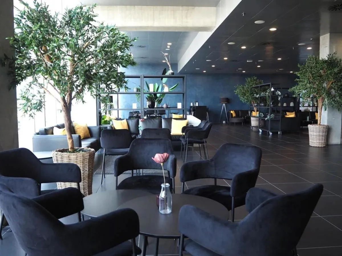 Communal lounge/ TV room in Cabinn Apartments