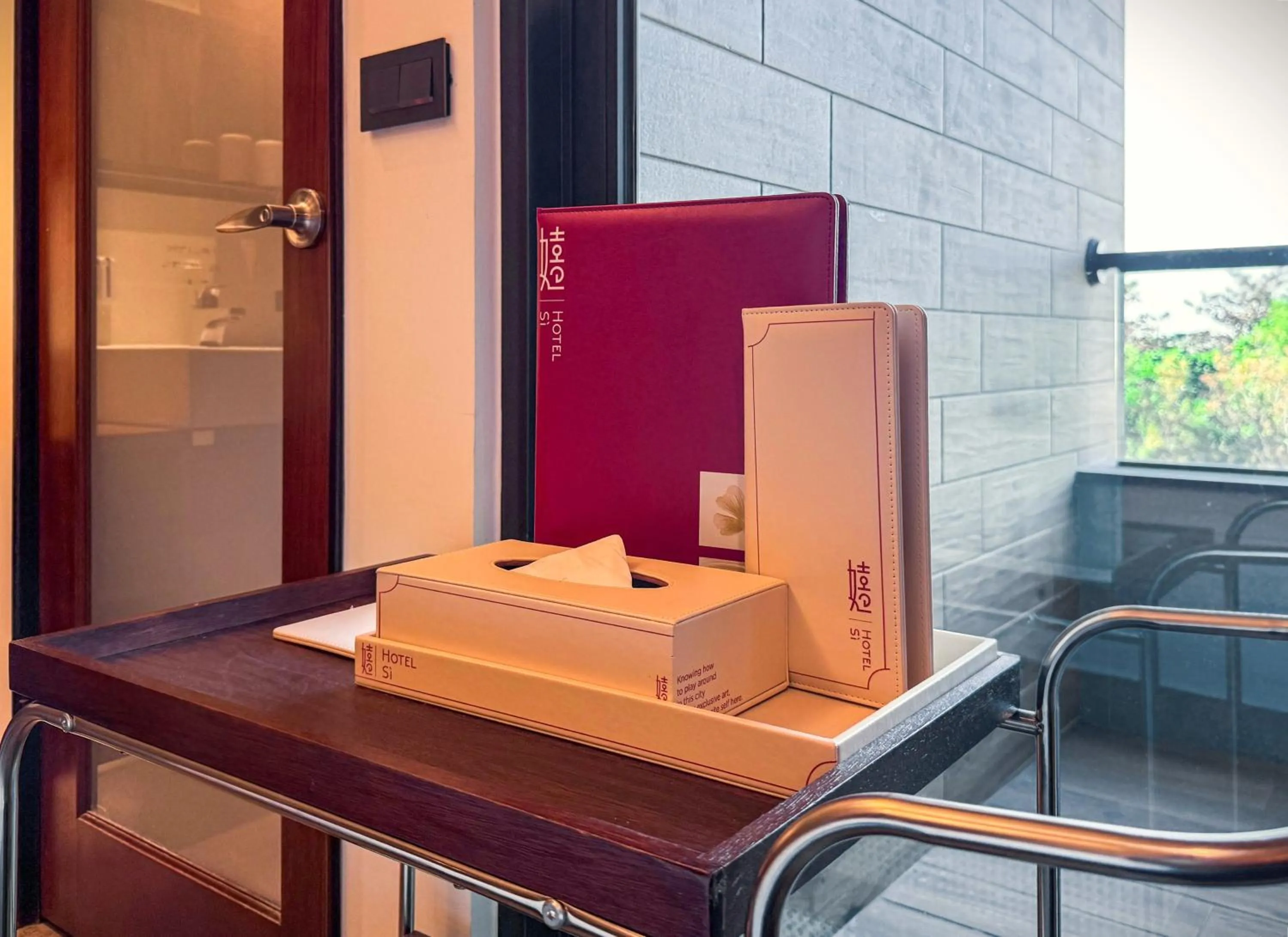 Property logo or sign in 嬉安平 Si Anping by Hotel Si