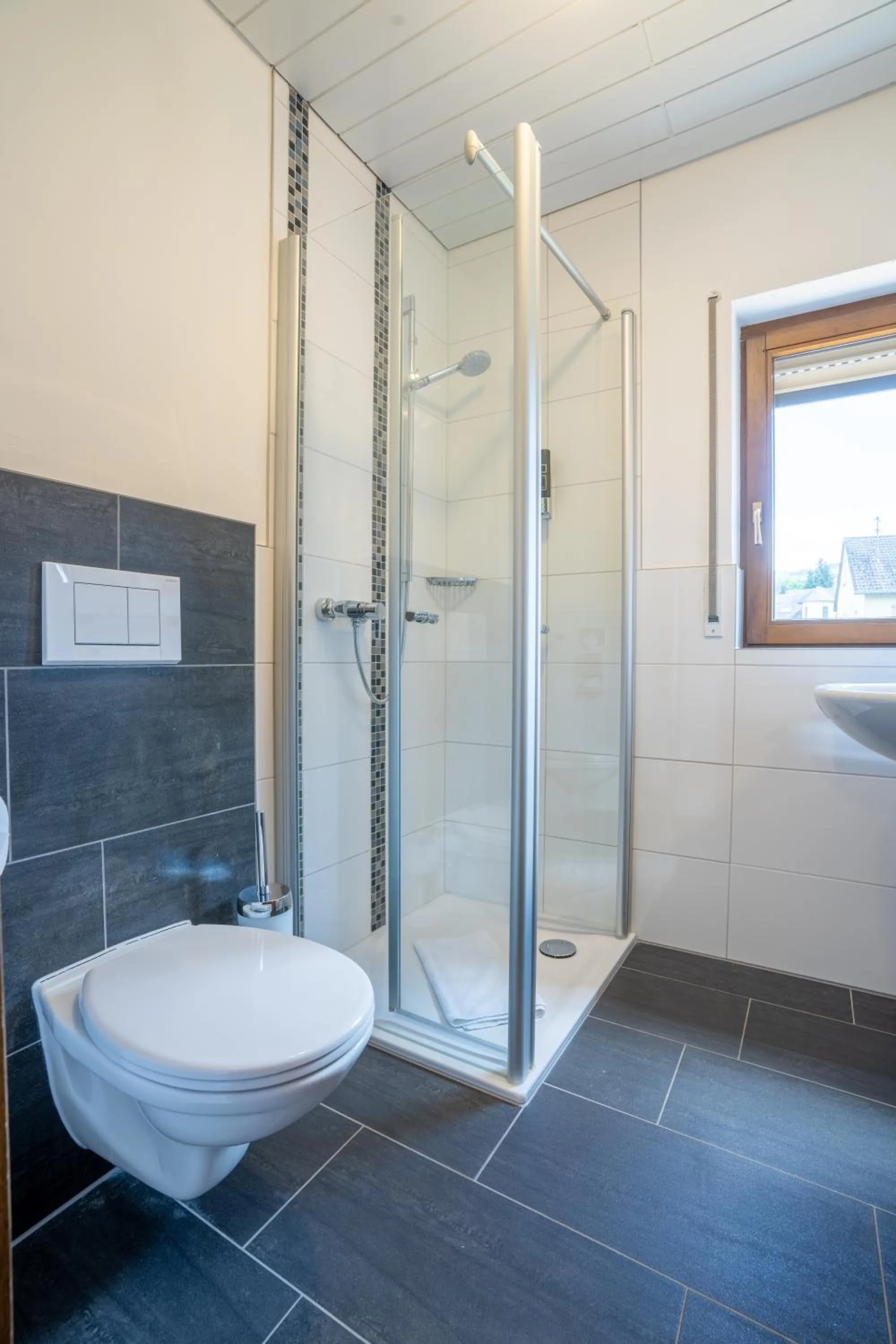 Bathroom in Mühlengarten by Relax Inn - Self Check In & Free Parking