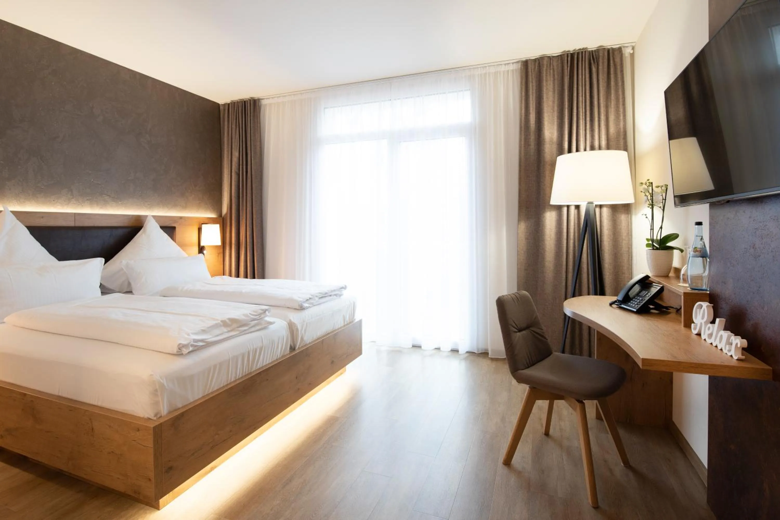 Bed in PETERS Hotel & Spa