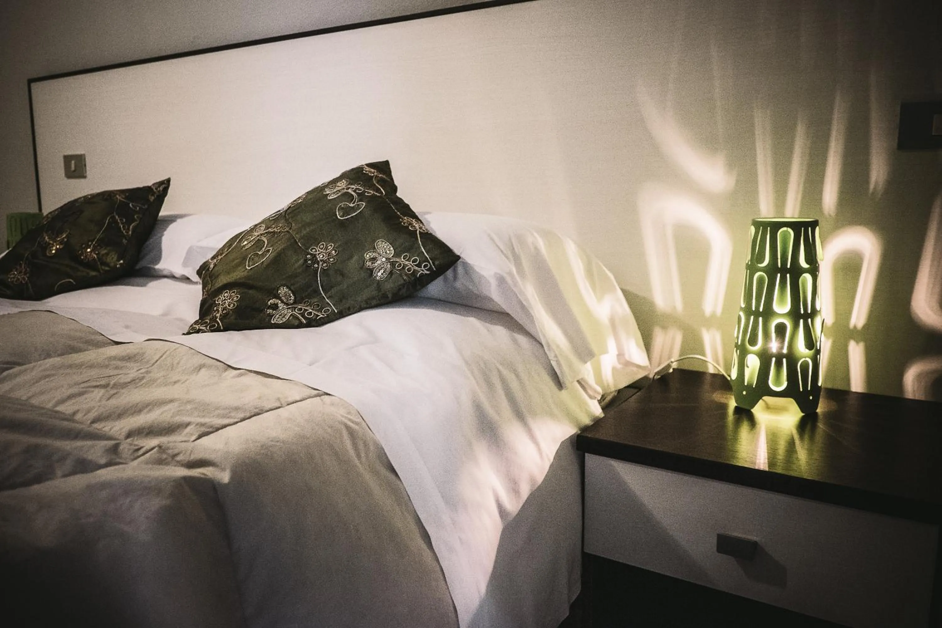 Decorative detail, Bed in Foresteria Del Pescatore