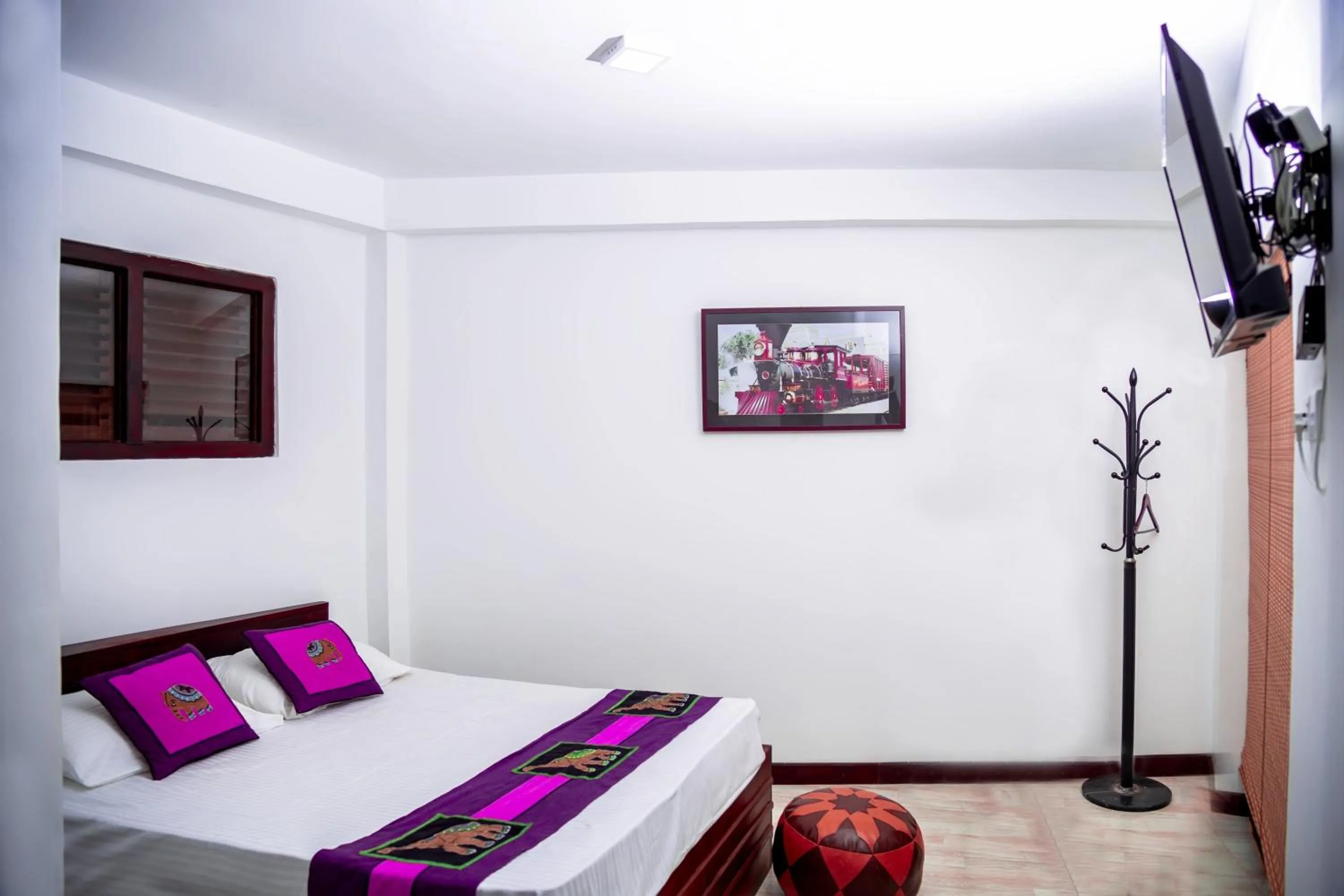 Bed in D Family Resort