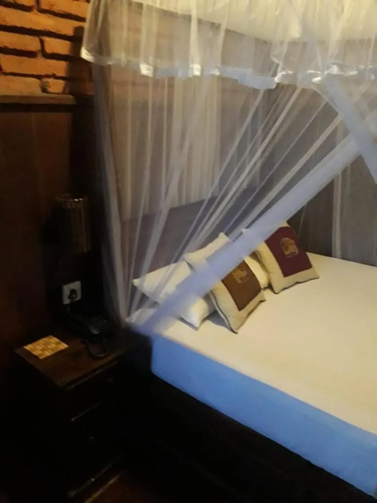 Bed in D Family Resort
