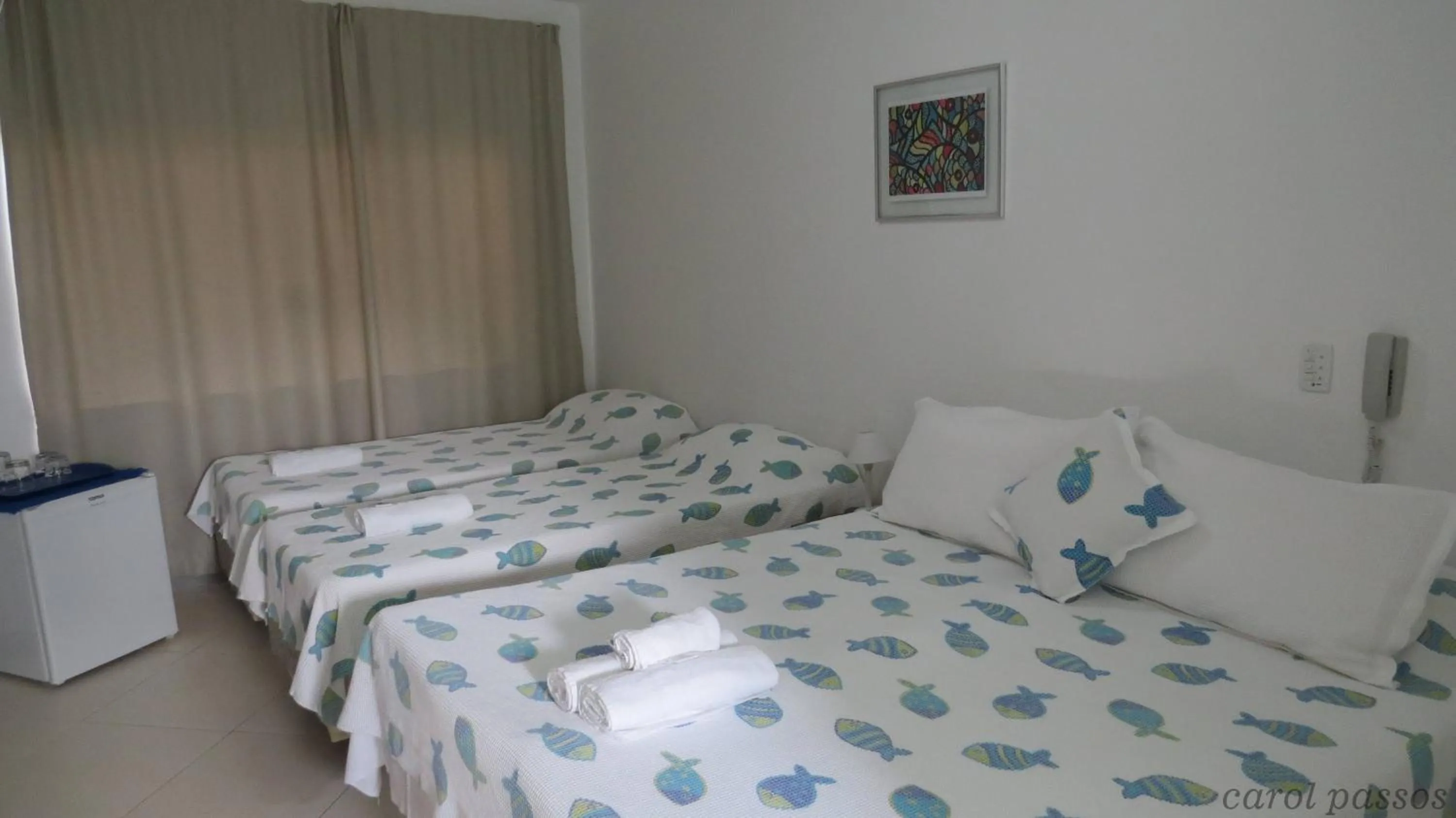 Bed in Pousada On Shore