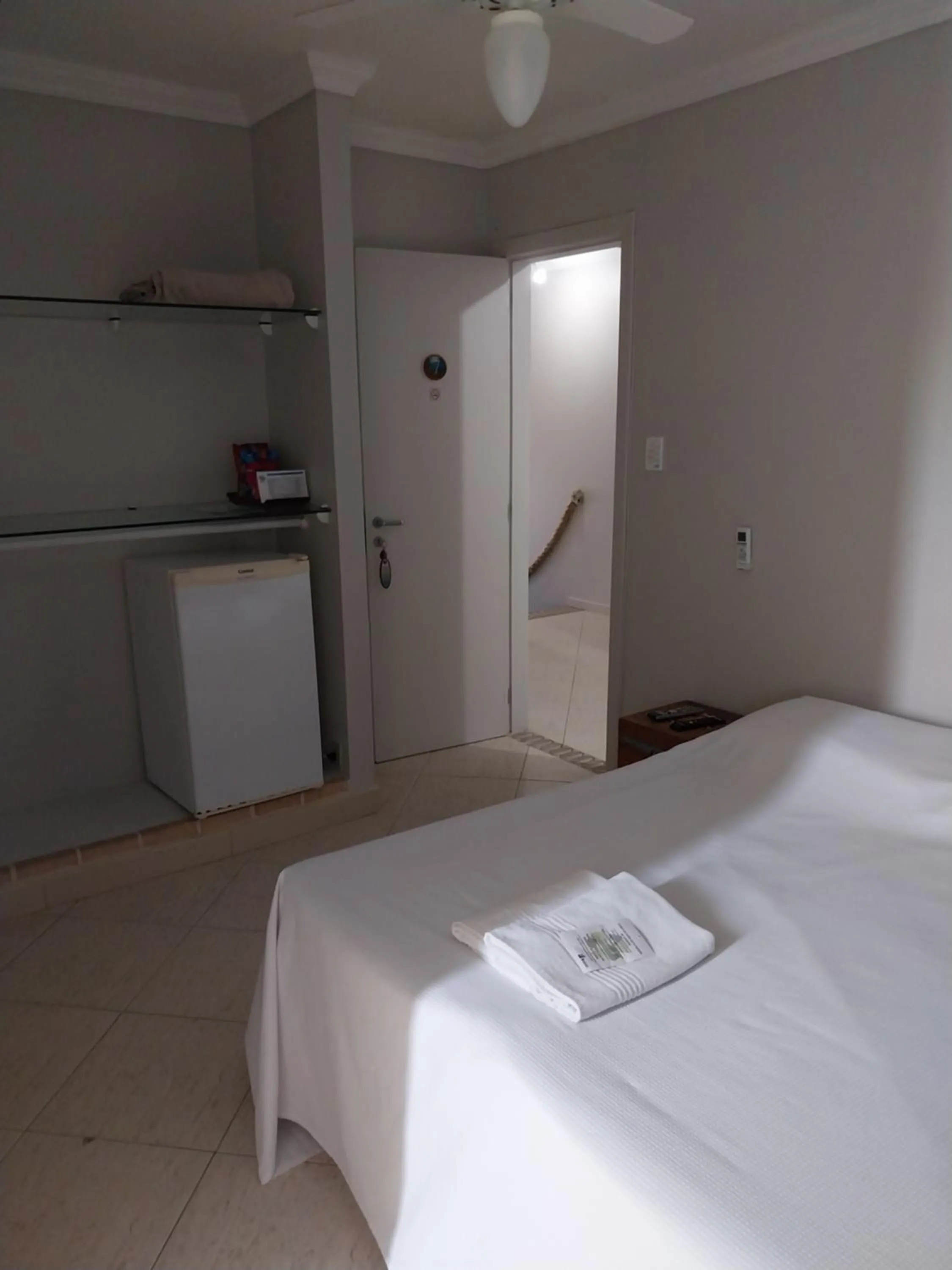 Bed in Pousada On Shore