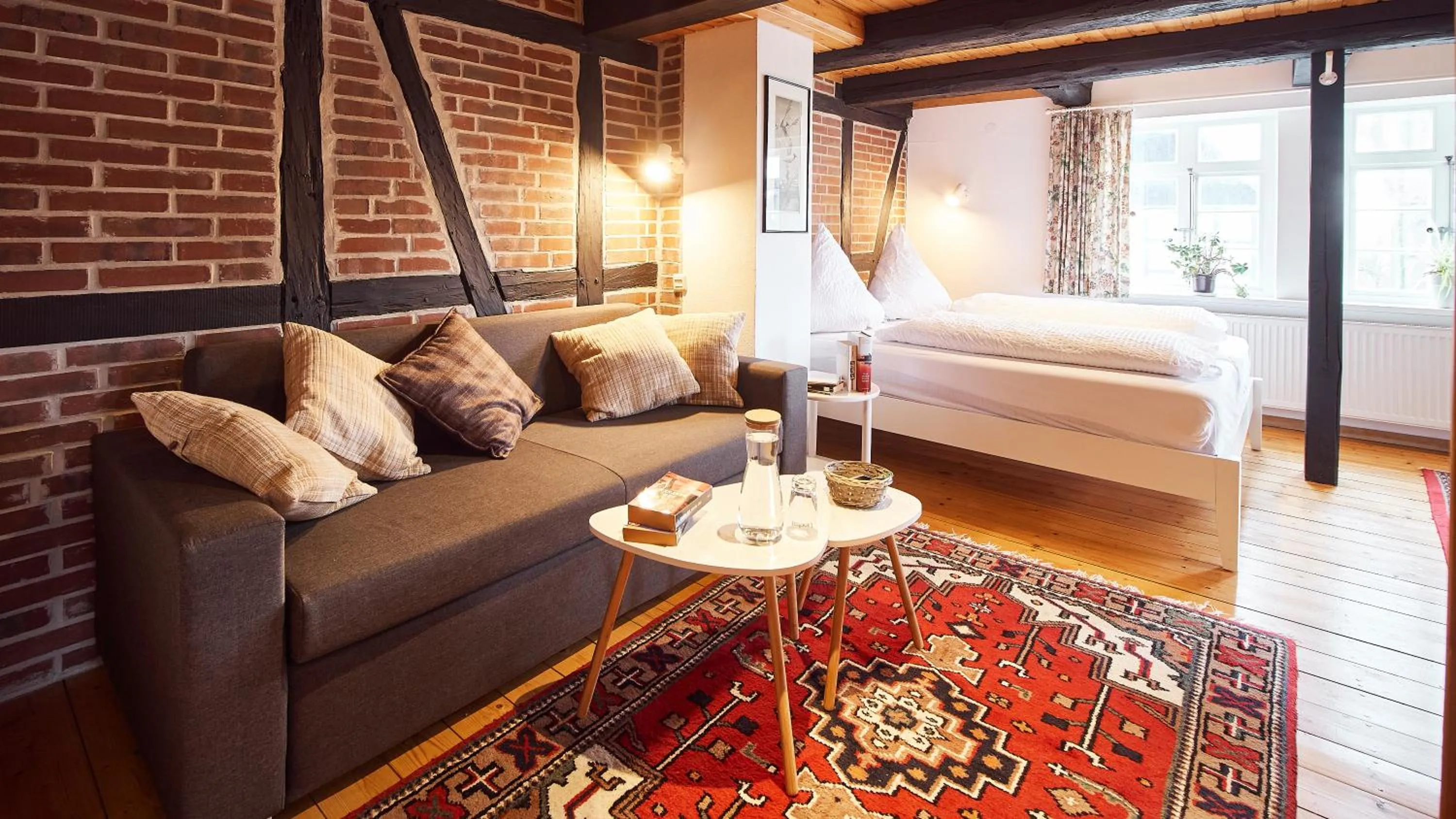 Living room, Bed in Appartementhotel Blomberger Hof