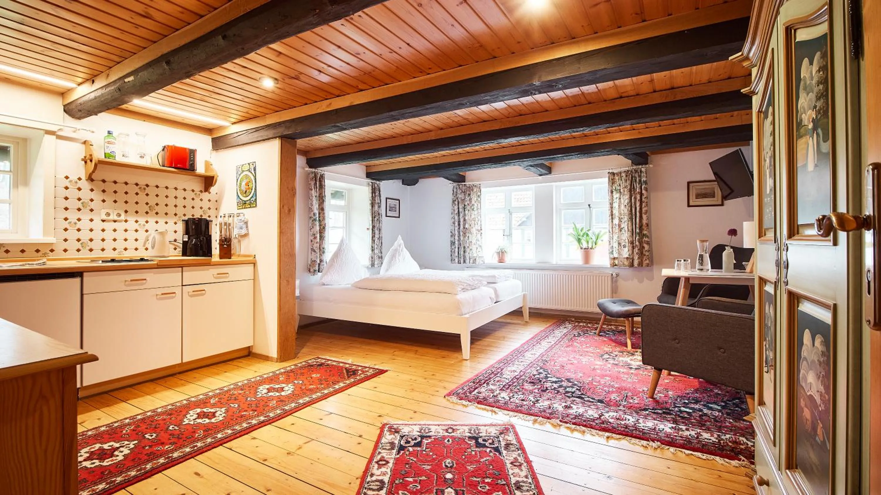 Living room, Bed in Appartementhotel Blomberger Hof