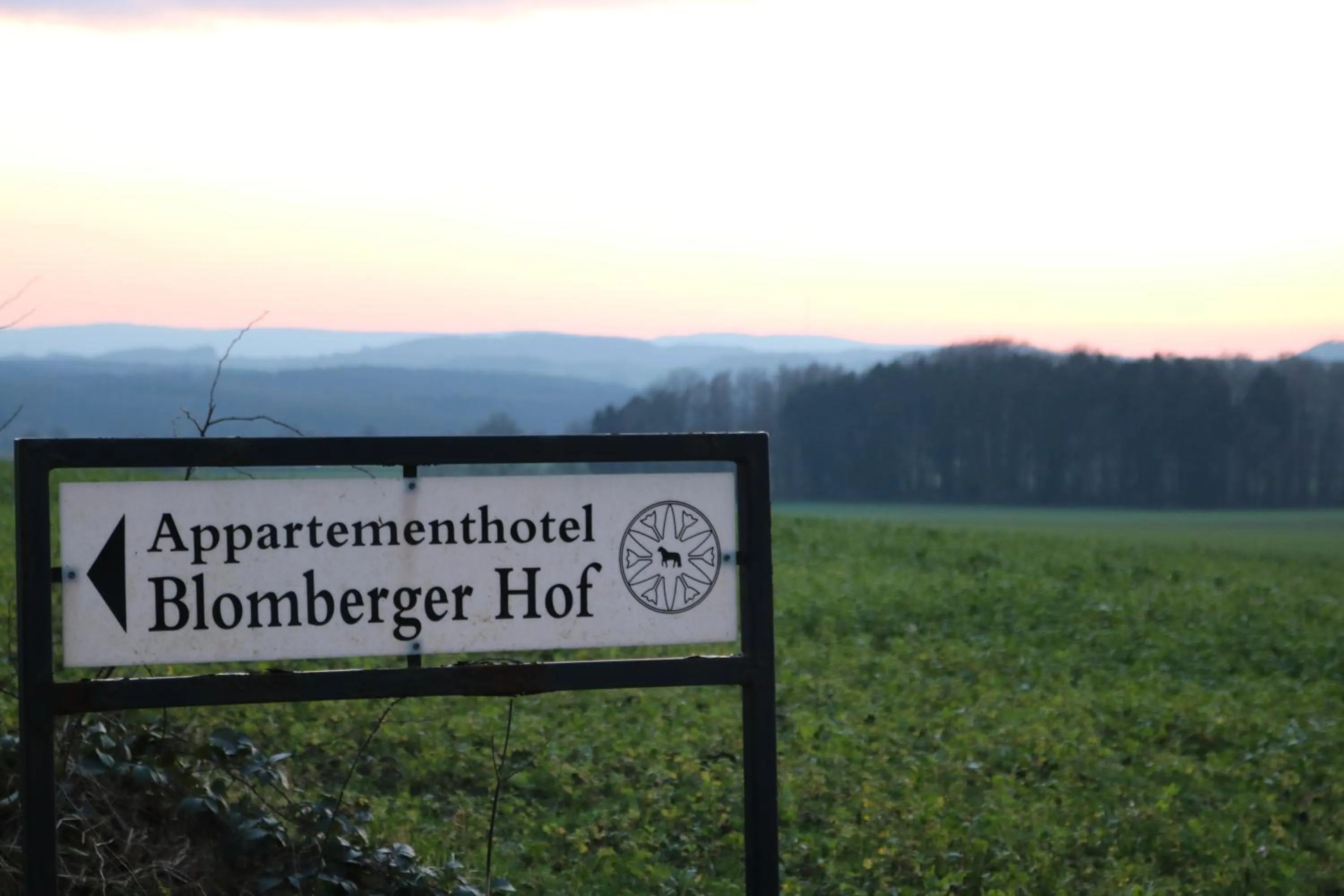 Property logo or sign in Appartementhotel Blomberger Hof