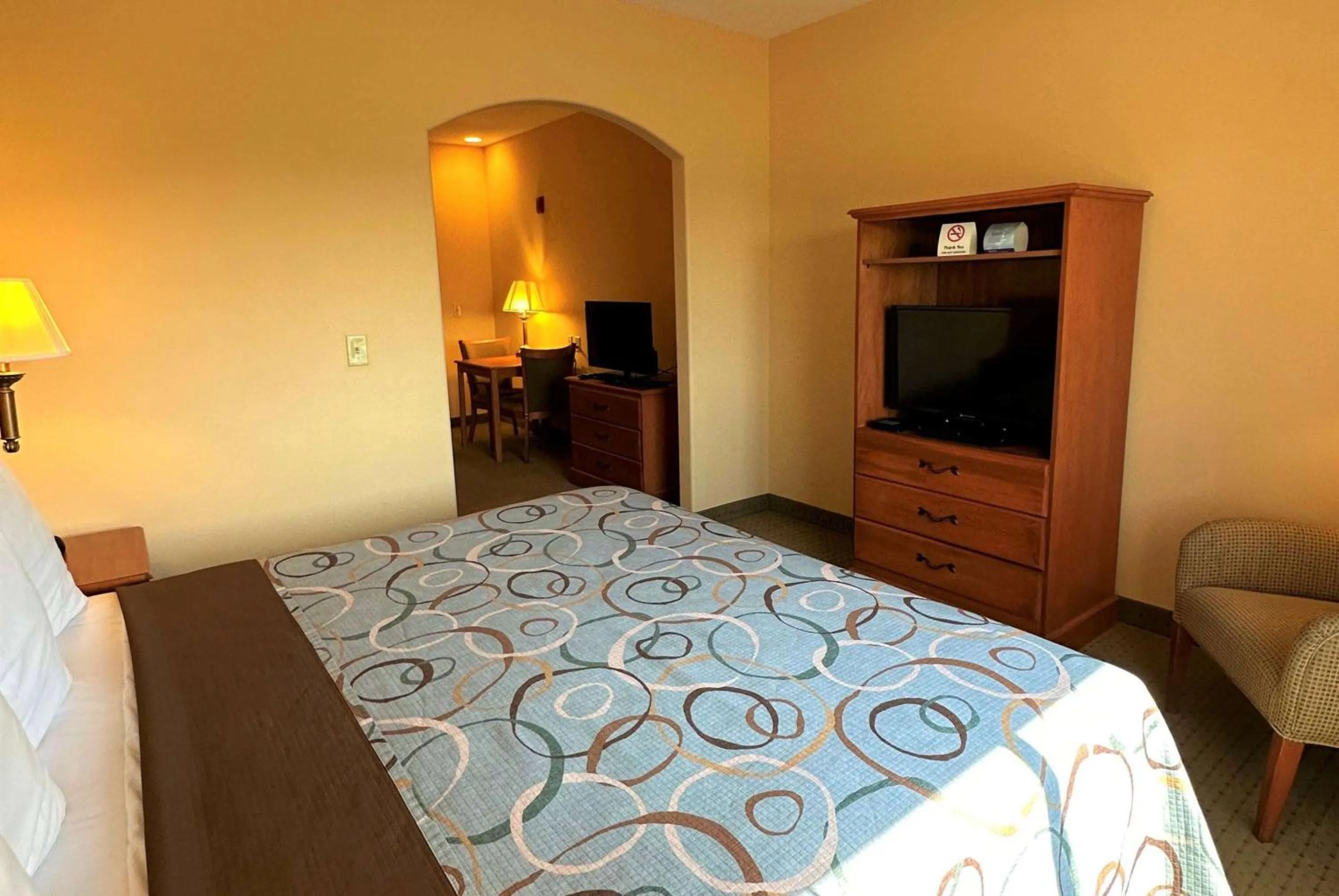 Photo of the whole room, Bed in Super 8 by Wyndham Topeka at Forbes Landing