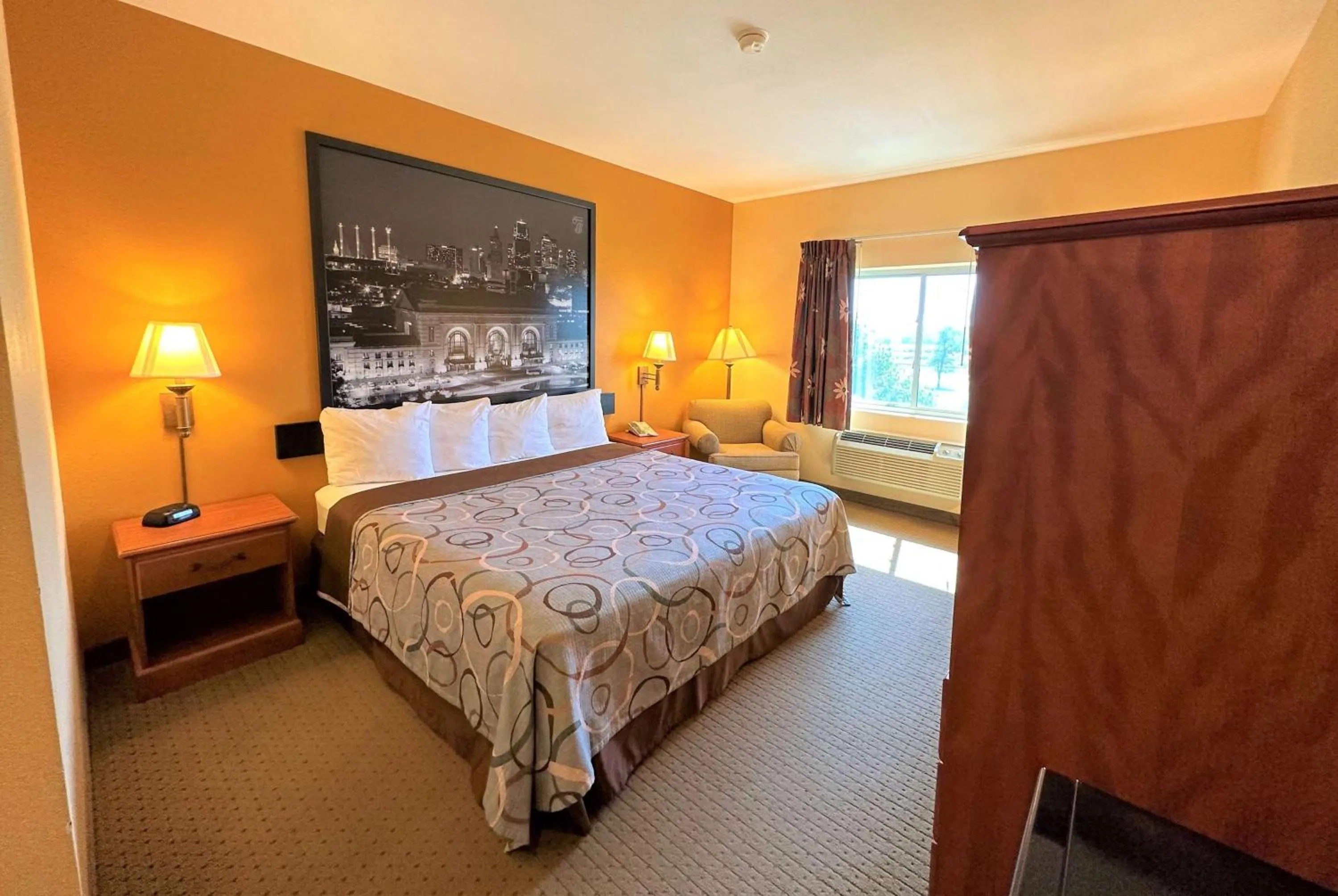 Photo of the whole room, Bed in Super 8 by Wyndham Topeka at Forbes Landing