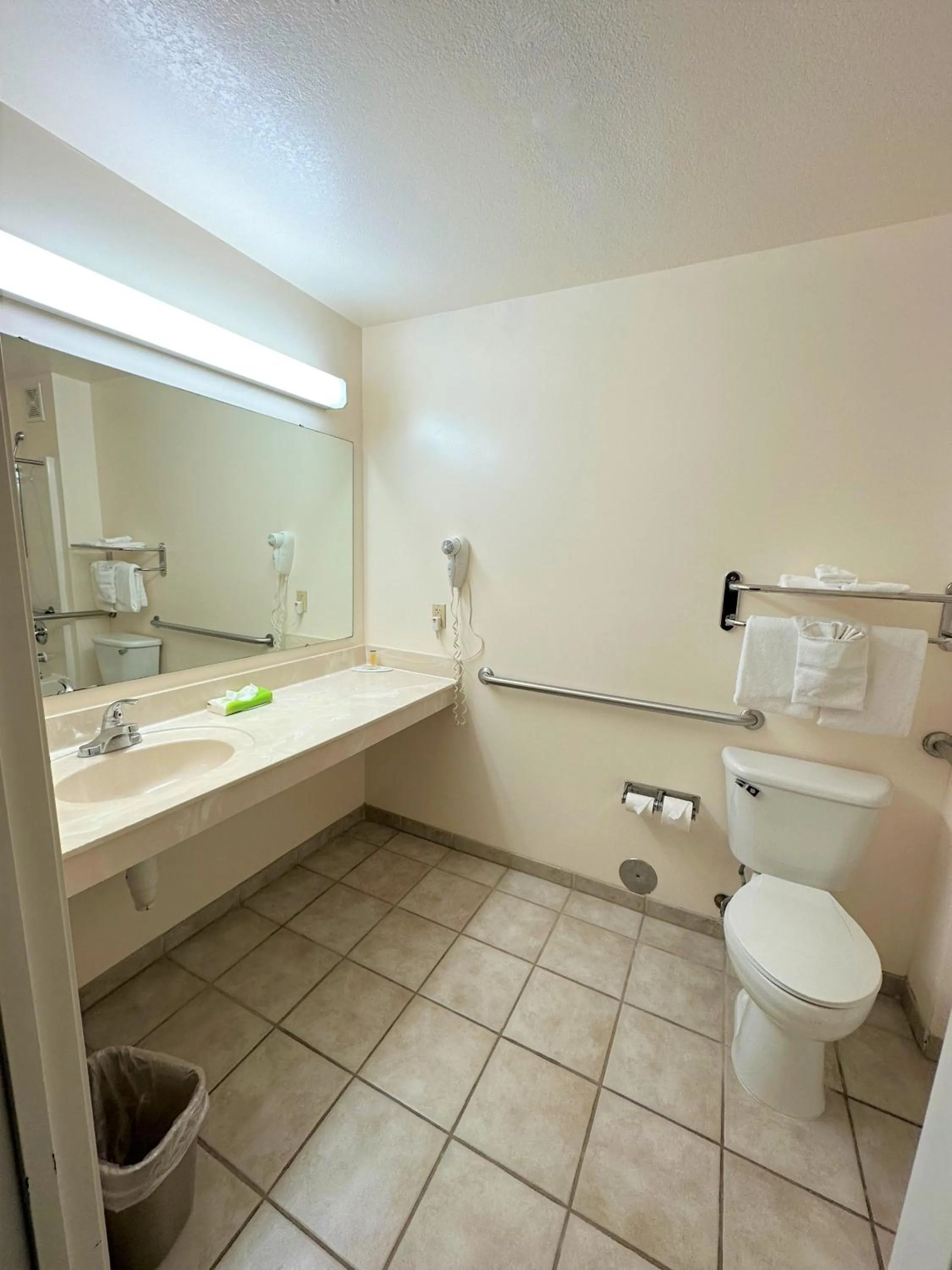 Bathroom in Super 8 by Wyndham Topeka at Forbes Landing