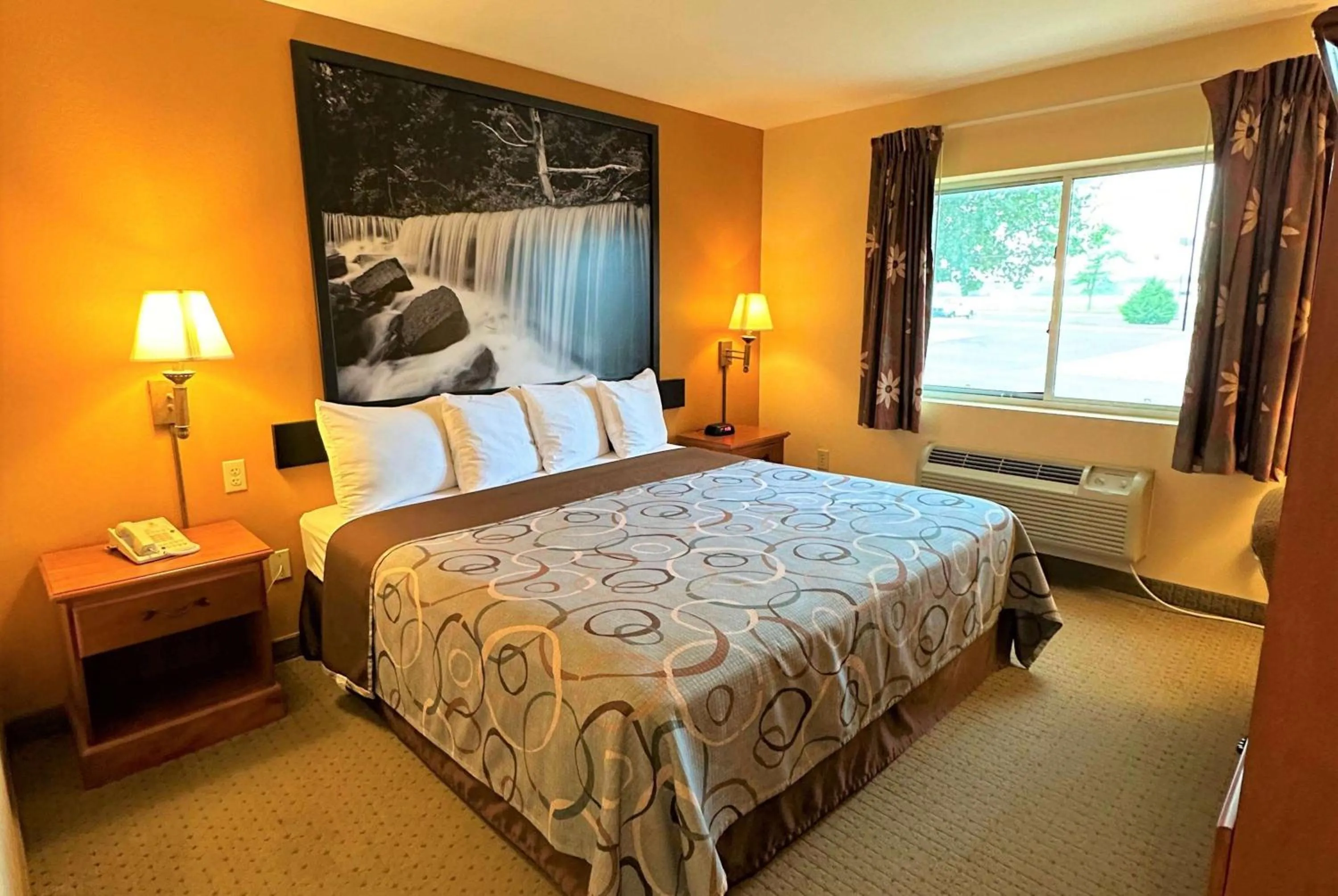 Photo of the whole room, Bed in Super 8 by Wyndham Topeka at Forbes Landing
