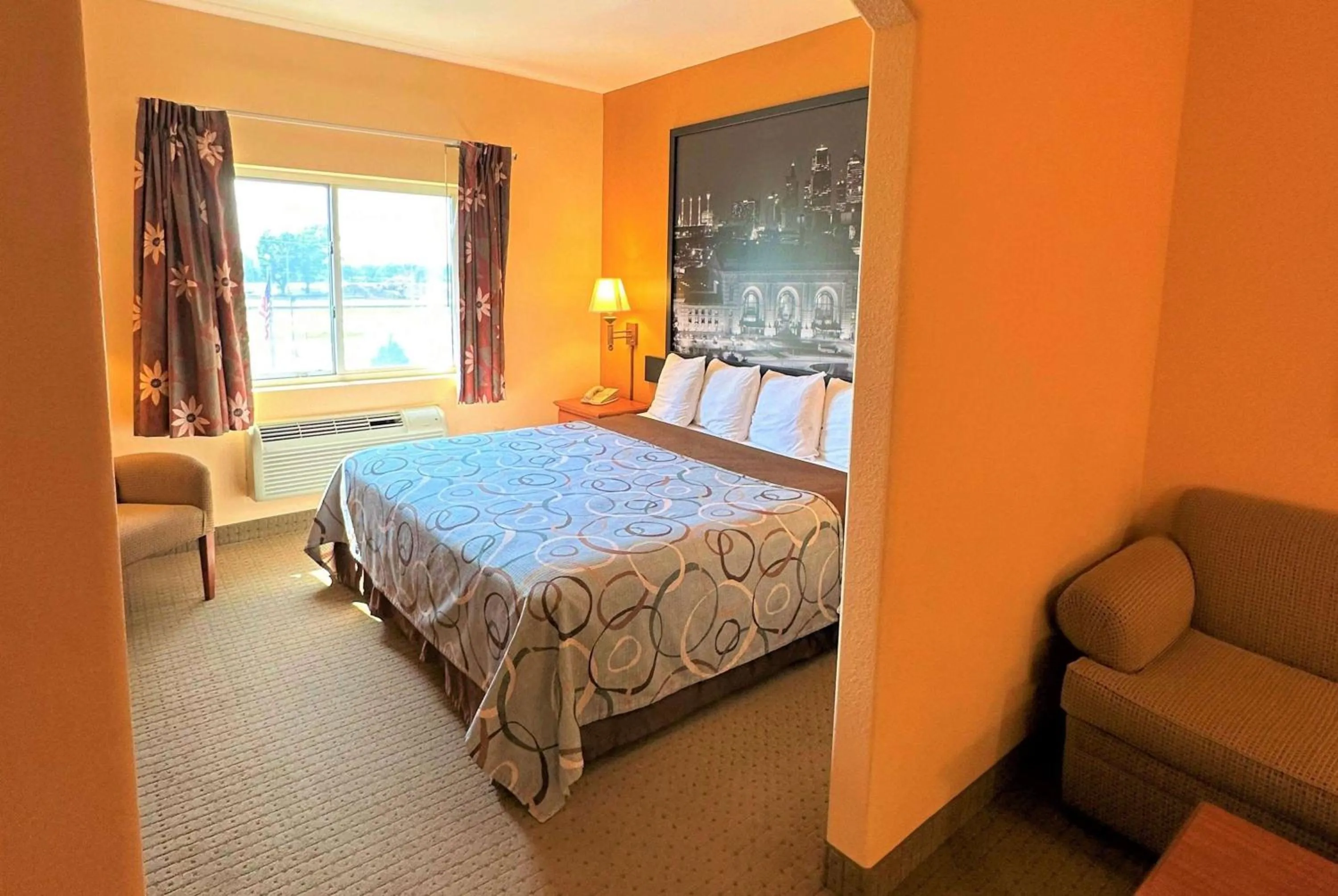 Photo of the whole room, Bed in Super 8 by Wyndham Topeka at Forbes Landing