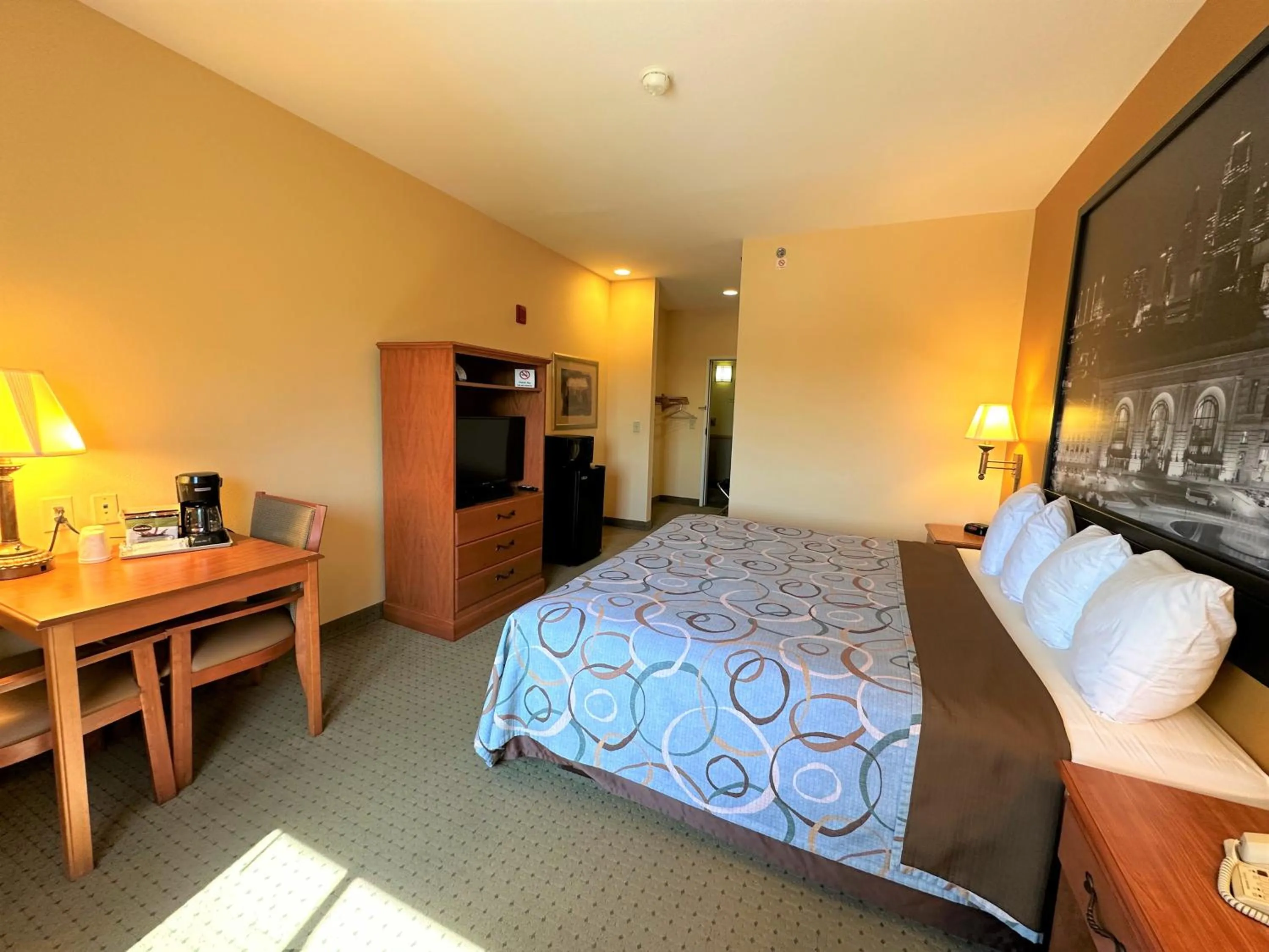 Photo of the whole room, Bed in Super 8 by Wyndham Topeka at Forbes Landing