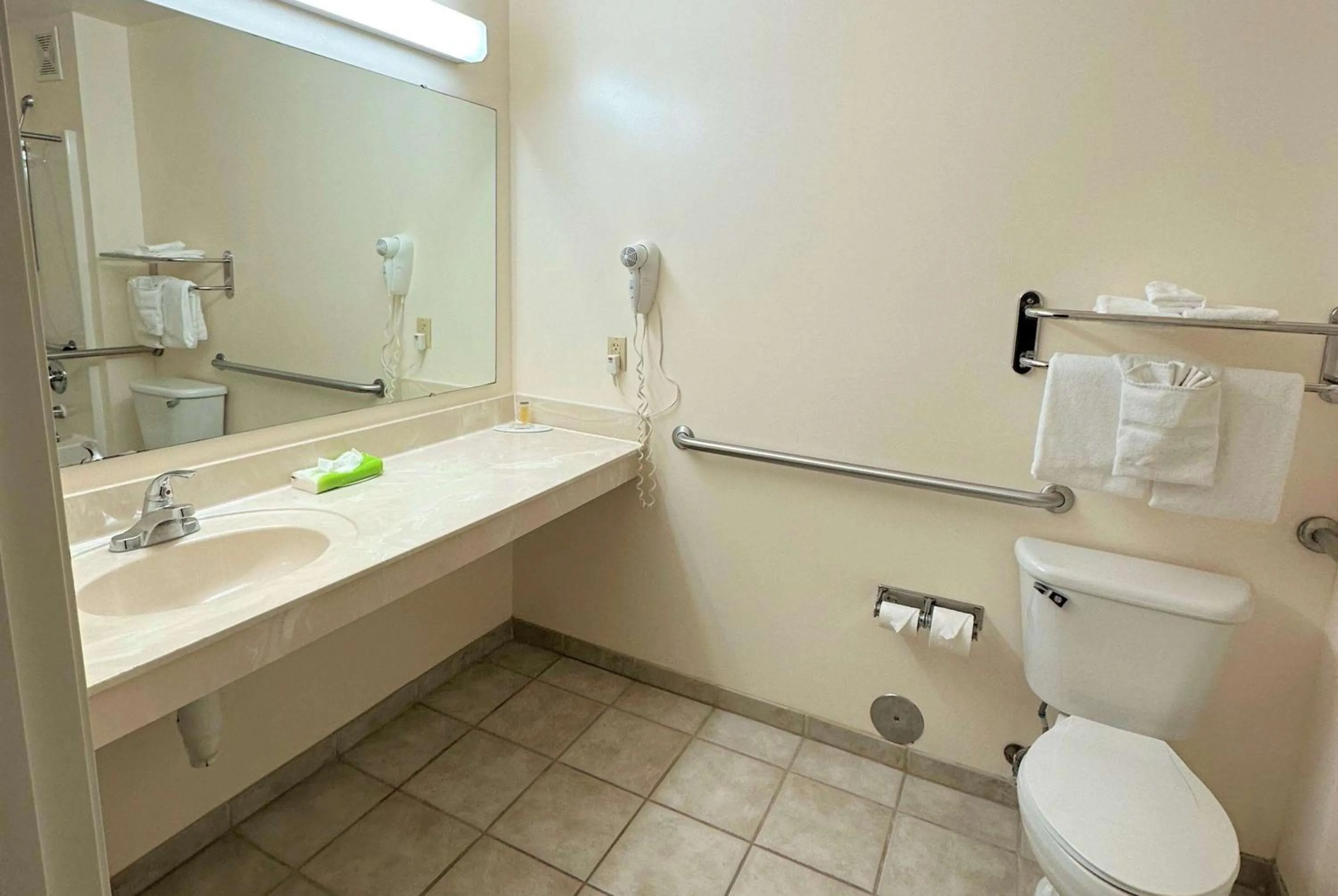 Bathroom in Super 8 by Wyndham Topeka at Forbes Landing