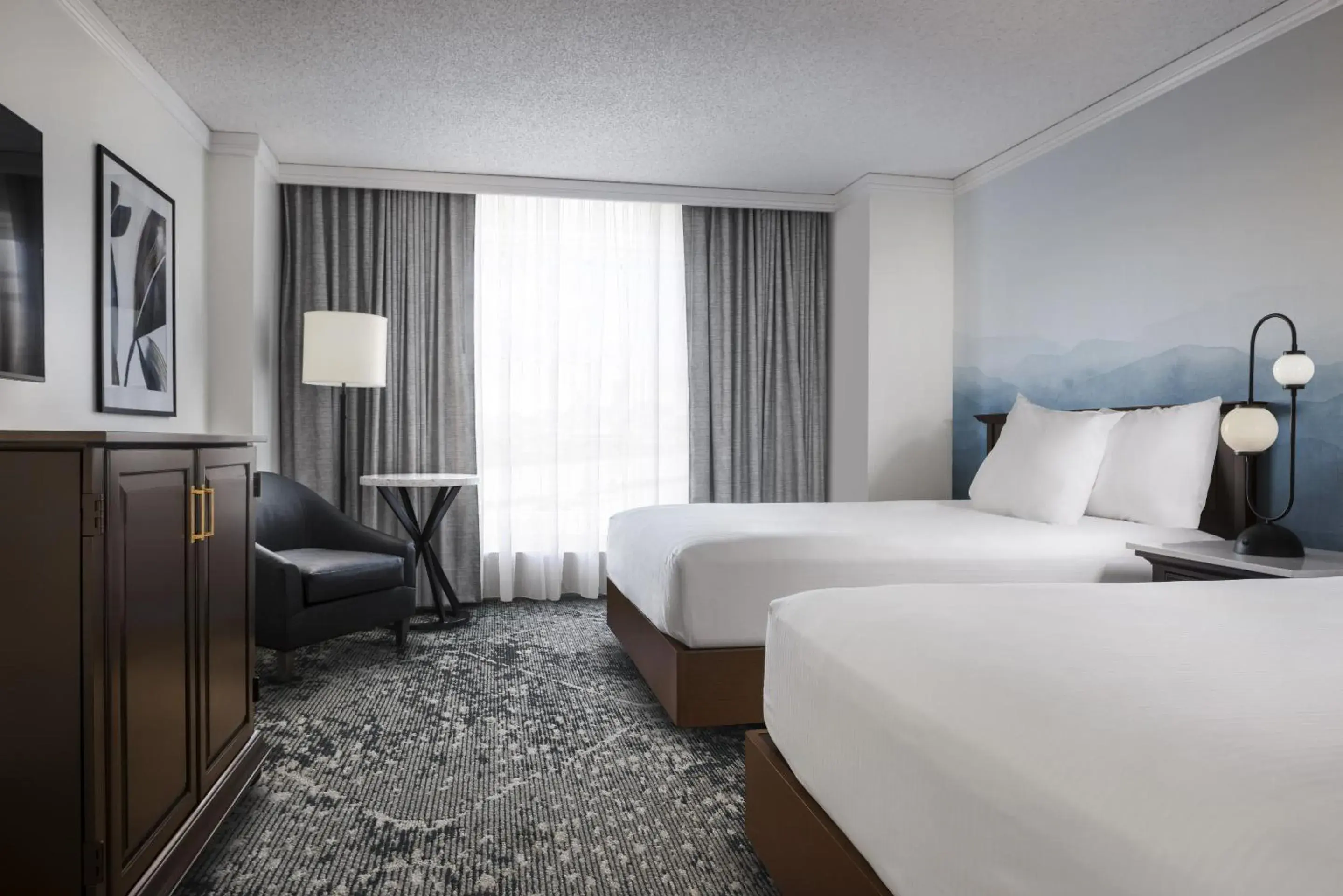 Deluxe Queen Room with Two Queen Beds in Harrah's Council Bluffs, A Caesars Destination Deluxe Queen Room with Two Queen Beds in Harrah's Council Bluffs, A Caesars Destination