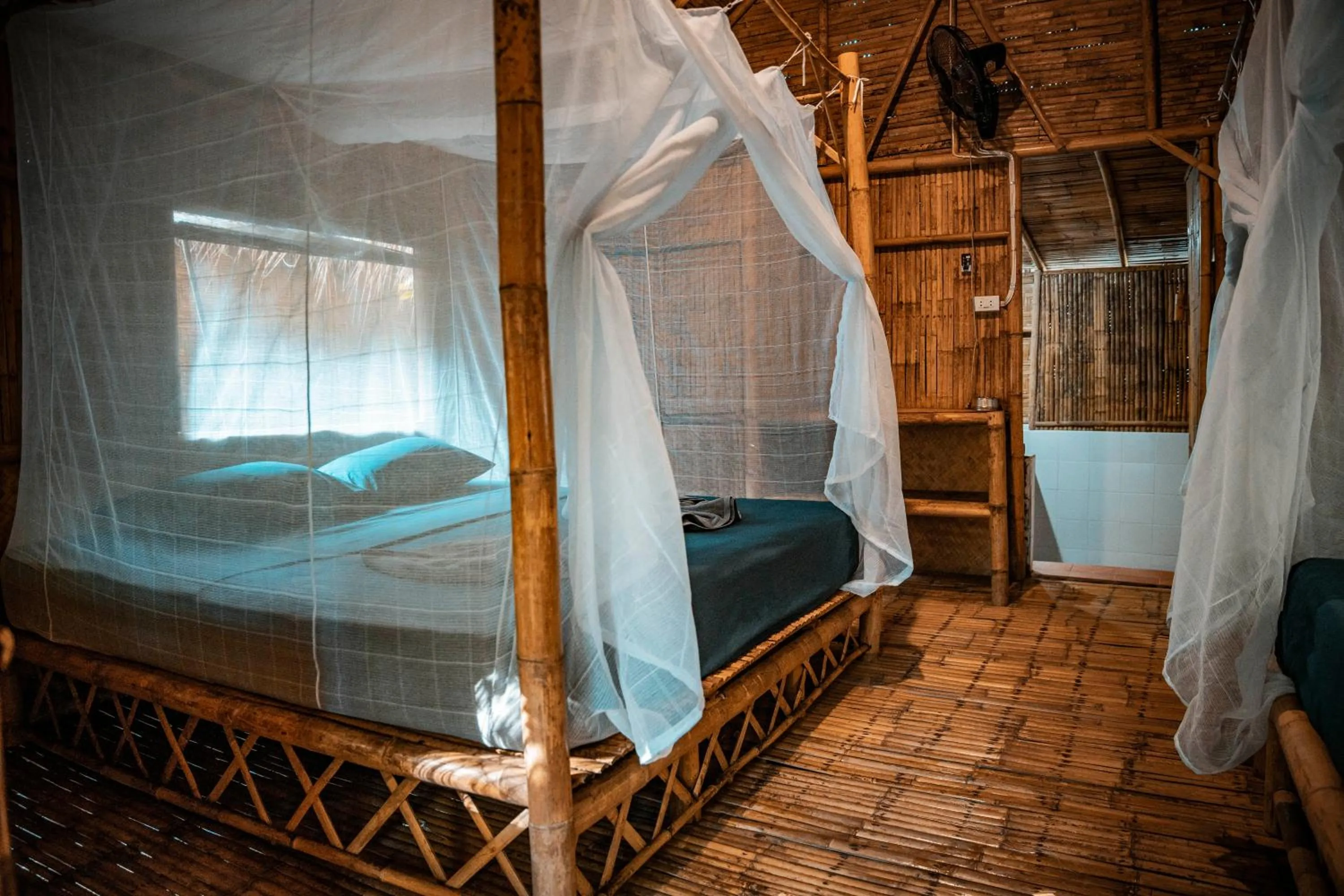 Bed in Green View Beach Resort