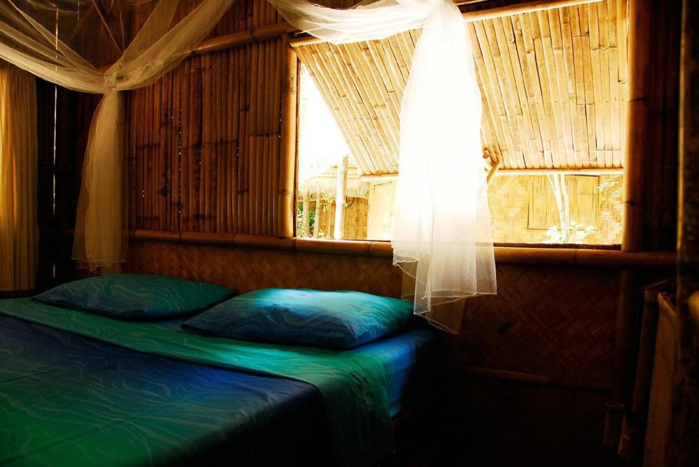 Bed in Green View Beach Resort
