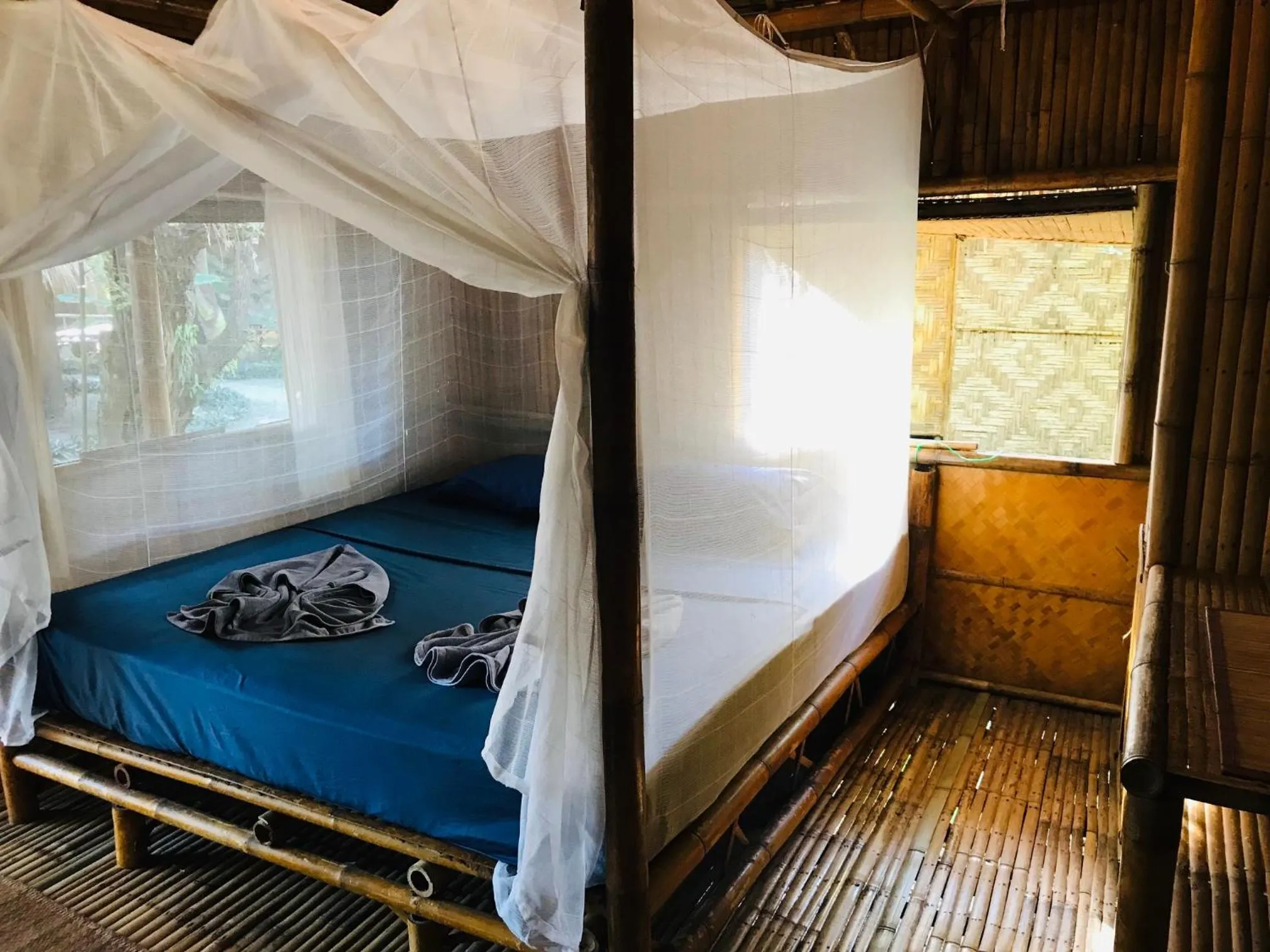 Bed in Green View Beach Resort