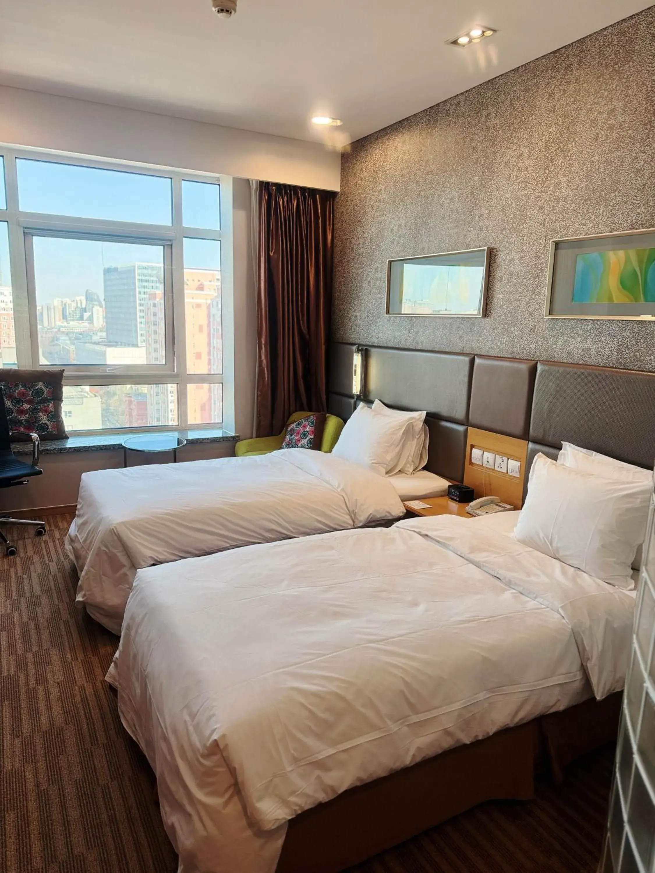 Bed in Holiday Inn Express Beijing Dongzhimen by IHG Bed in Holiday Inn Express Beijing Dongzhimen by IHG