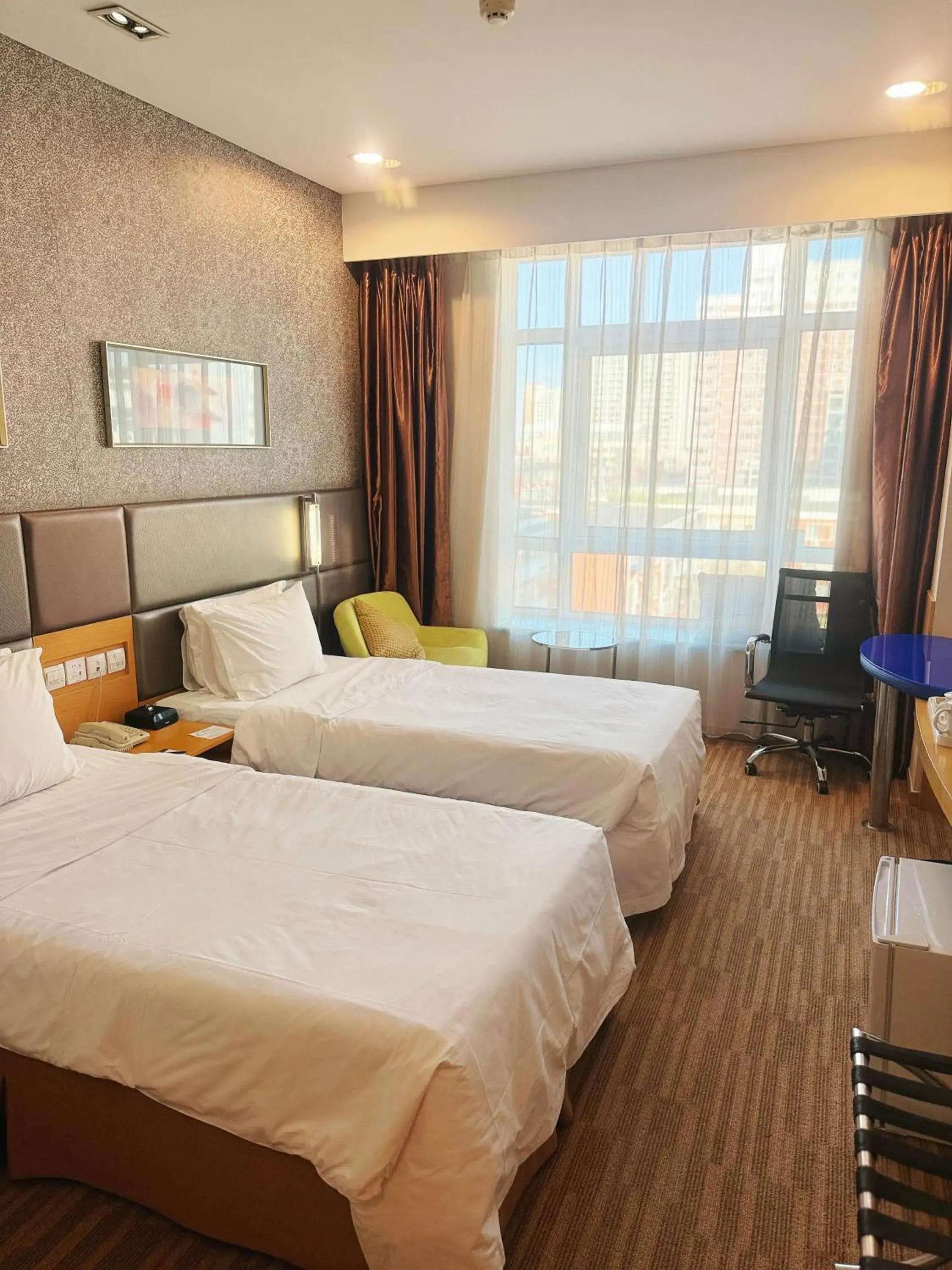 Bed in Holiday Inn Express Beijing Dongzhimen by IHG Bed in Holiday Inn Express Beijing Dongzhimen by IHG