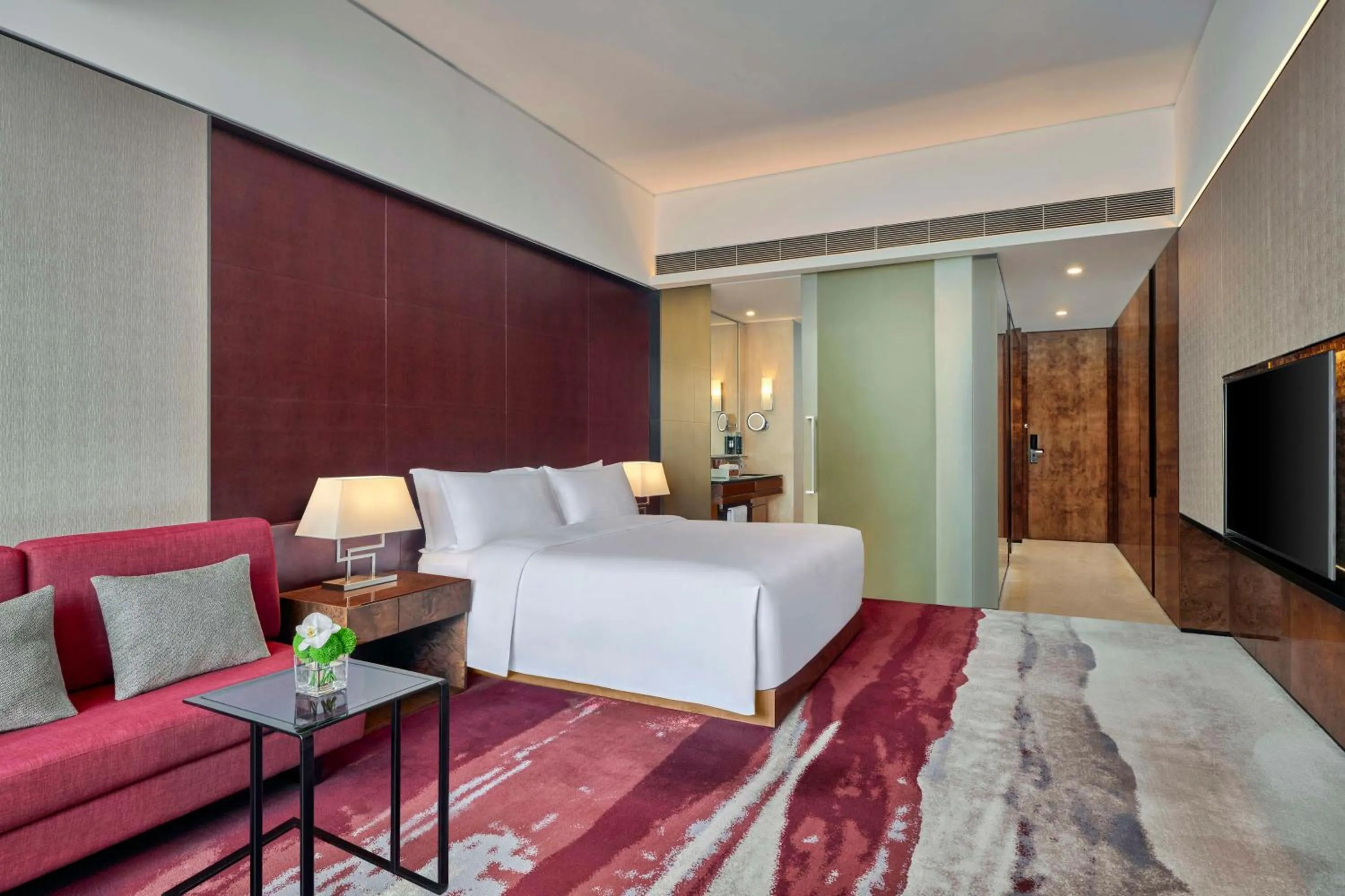 Living room, Bed in Hilton Guangzhou Tianhe