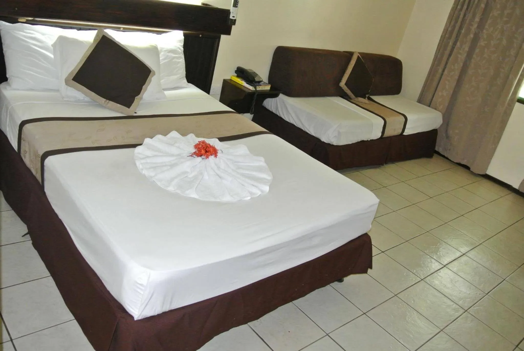 Bed in Grand Eastern Hotel