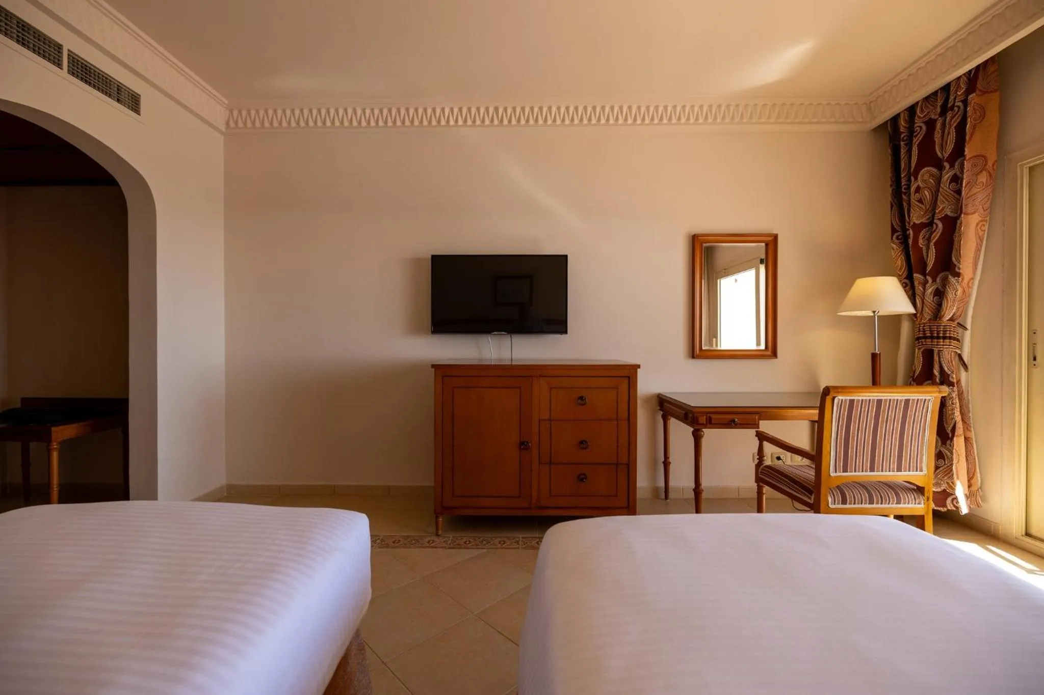 Photo of the whole room, Bed in Continental Plaza Beach Resort