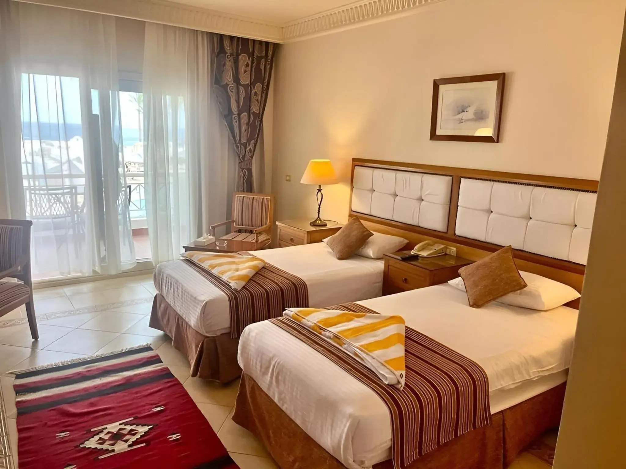 View (from property/room), Bed in Continental Plaza Beach Resort View (from property/room), Bed in Continental Plaza Beach Resort