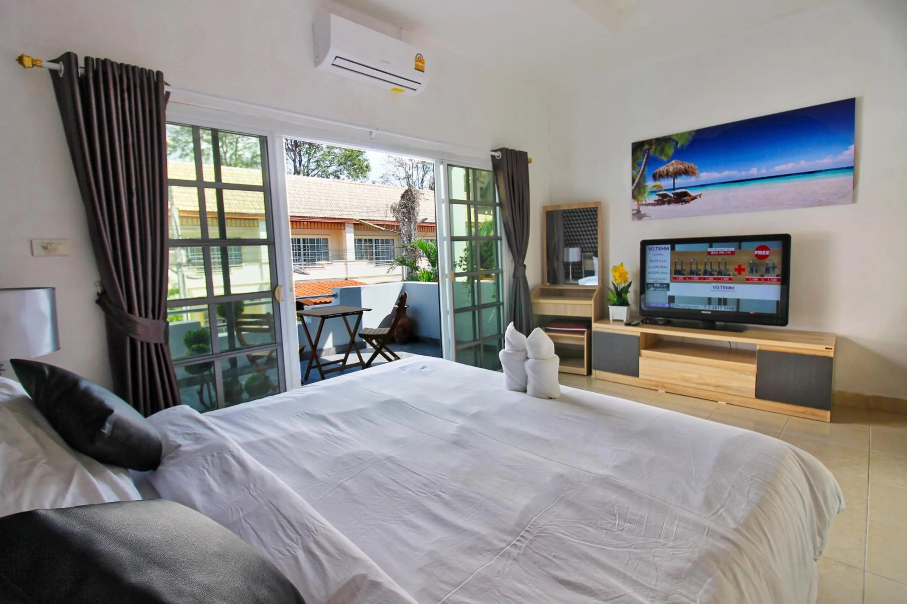 Bed in Grande Adam Private Pool Villa