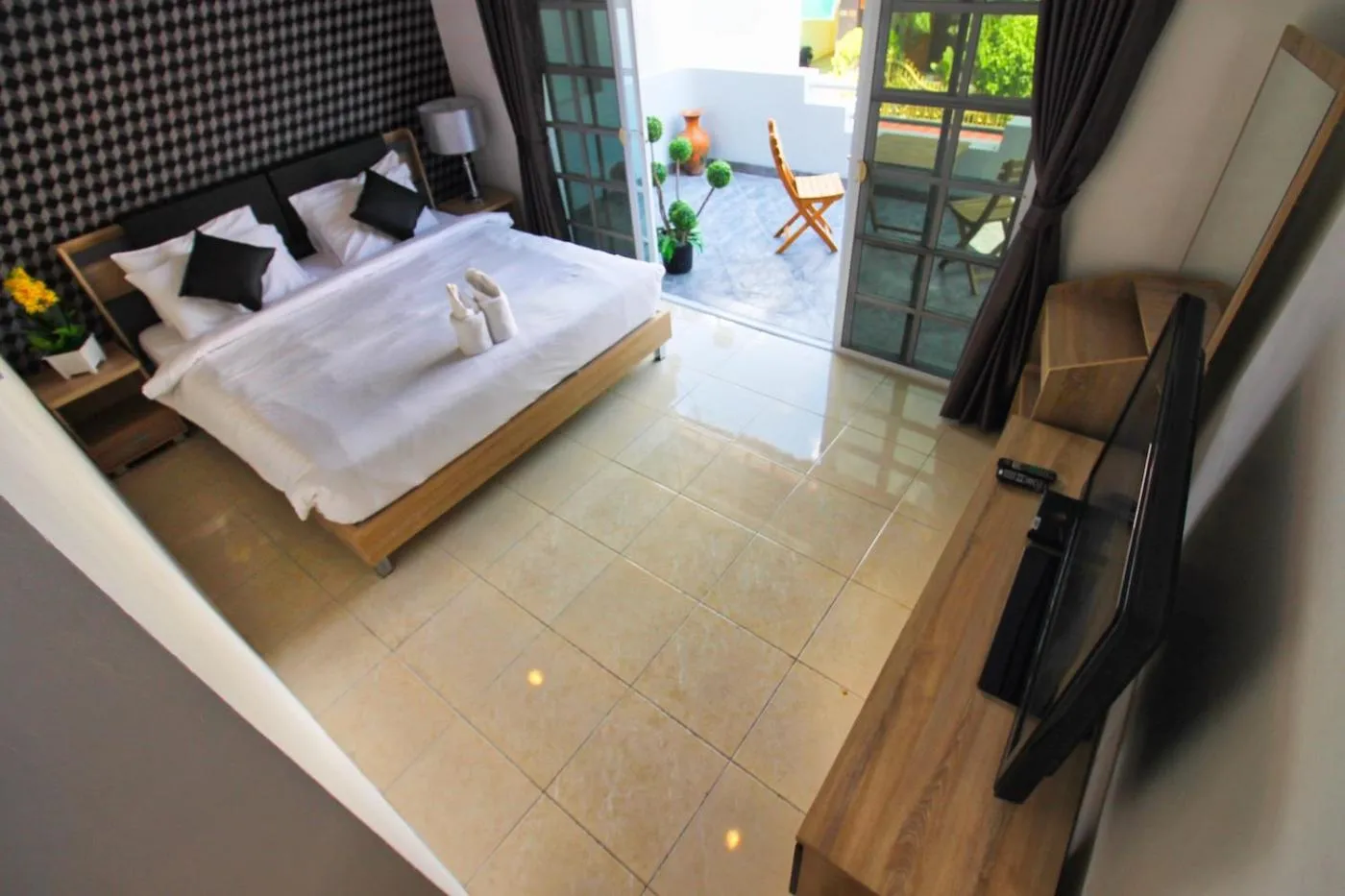 Bed in Grande Adam Private Pool Villa