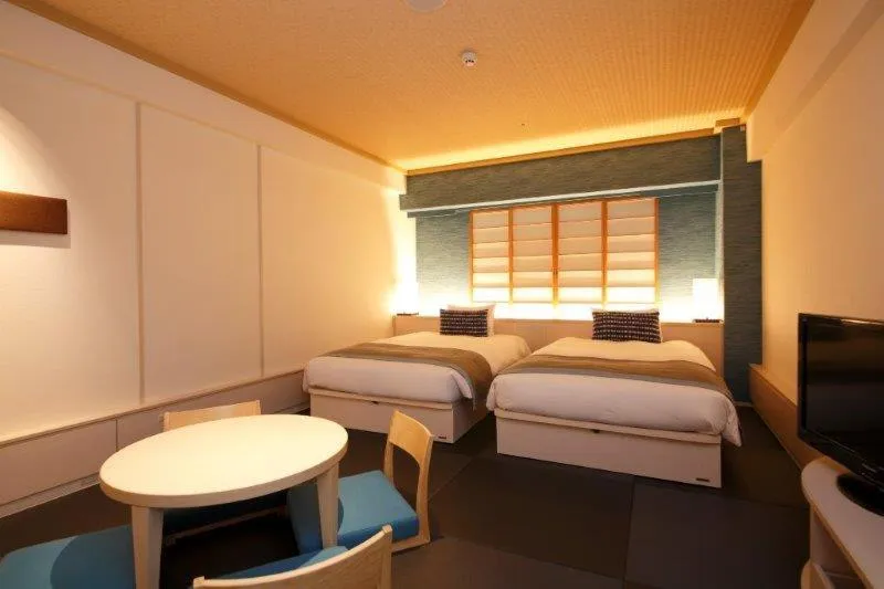 TV and multimedia, Bed in Loisir Hotel Naha