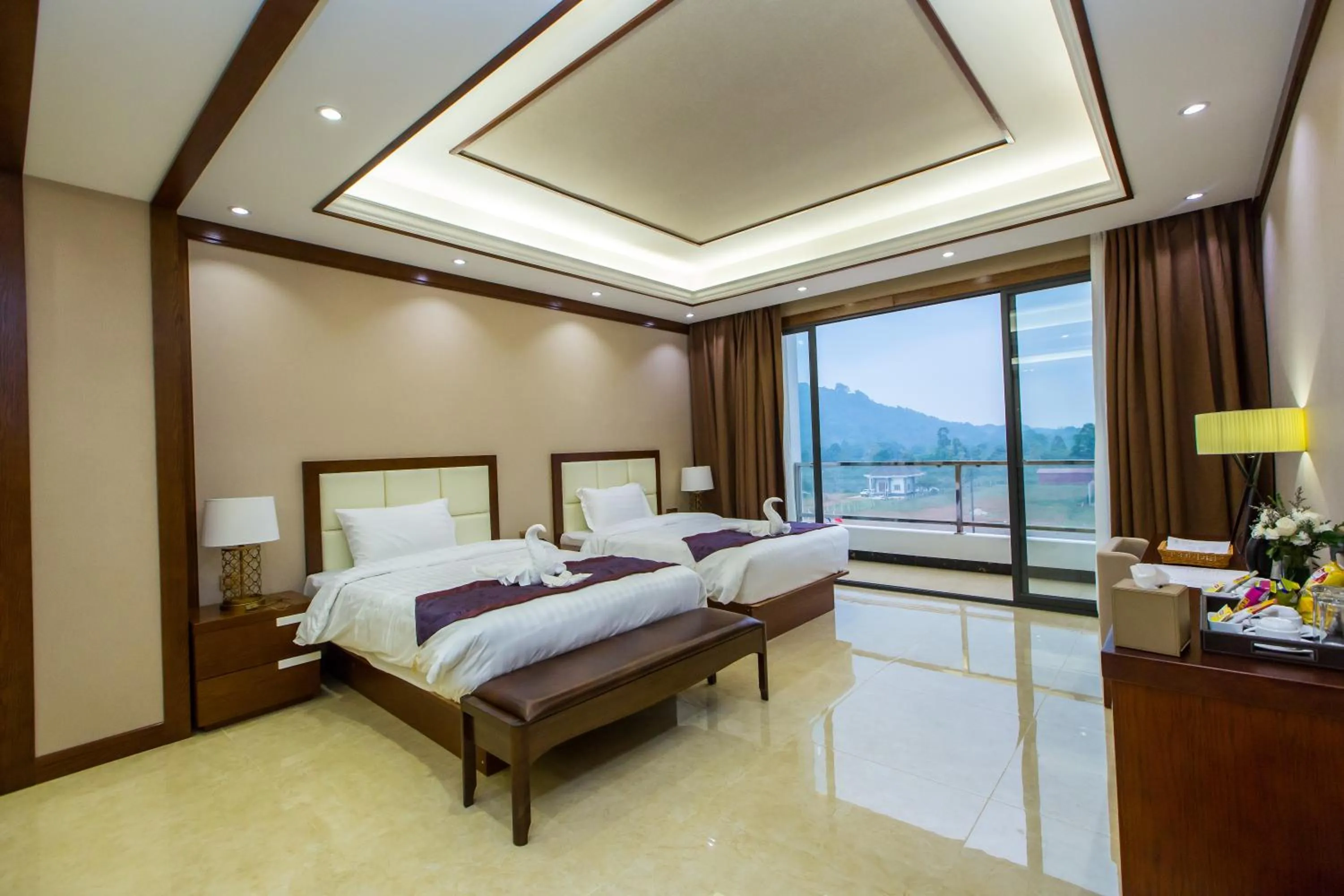 Bed in Paksong Danngarm Hotel