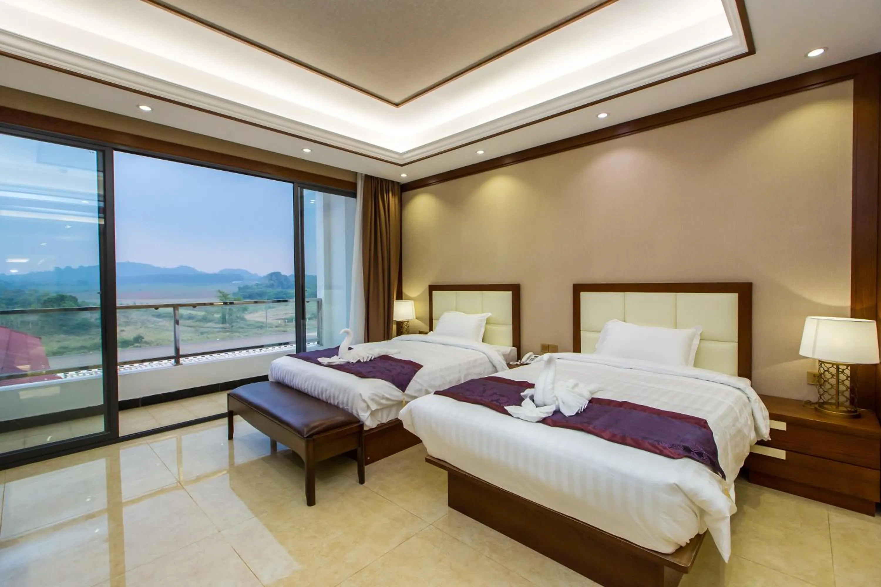 Bed in Paksong Danngarm Hotel