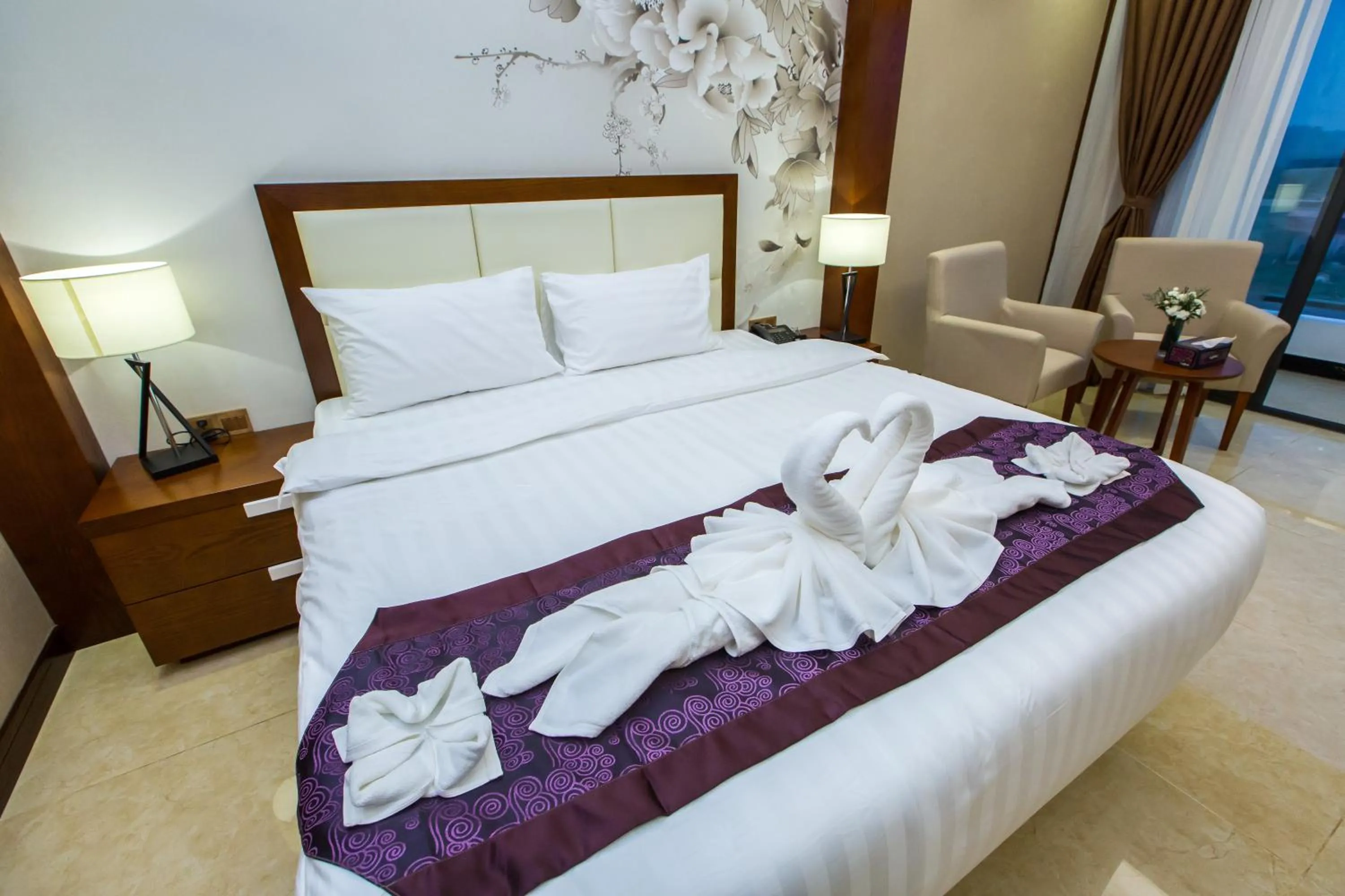 Bed in Paksong Danngarm Hotel