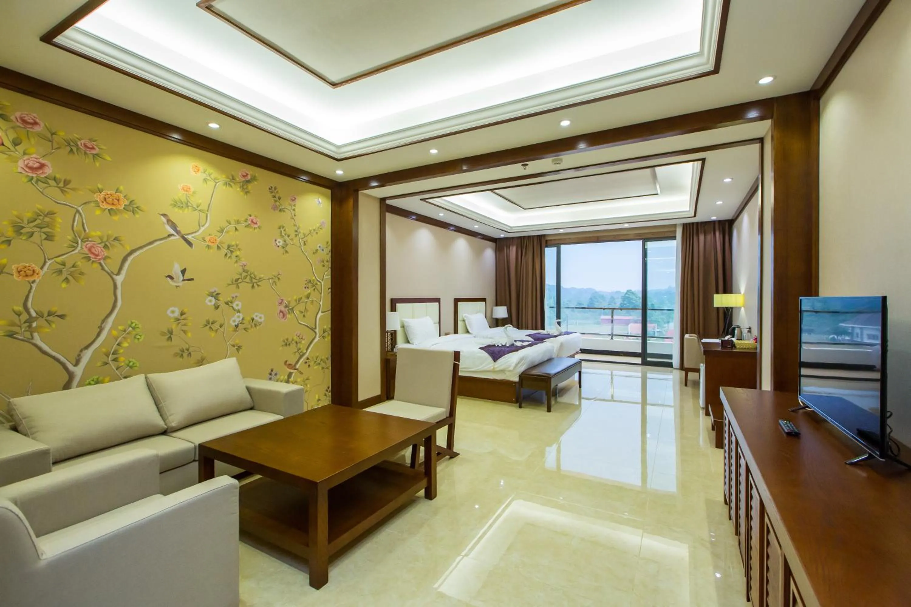 Bed in Paksong Danngarm Hotel