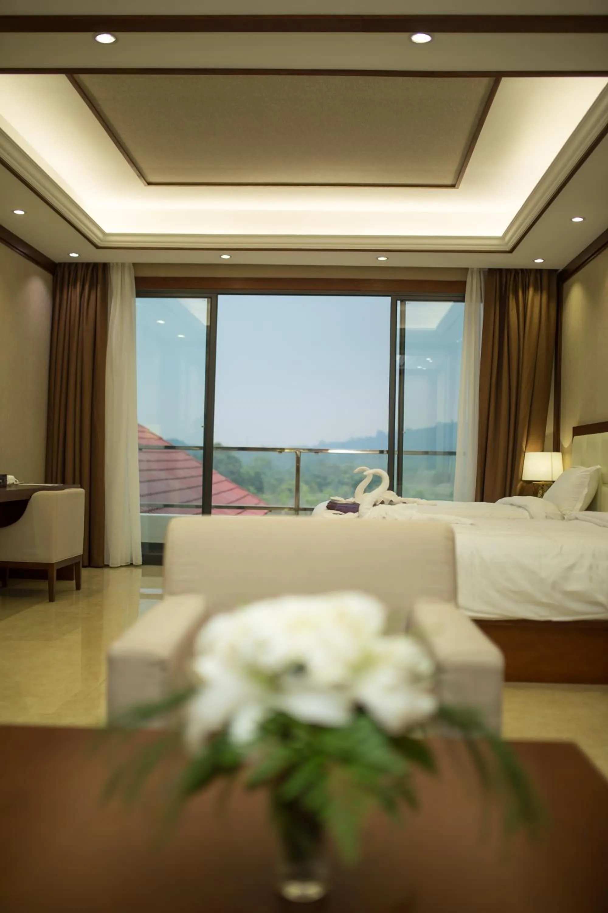 Bed in Paksong Danngarm Hotel