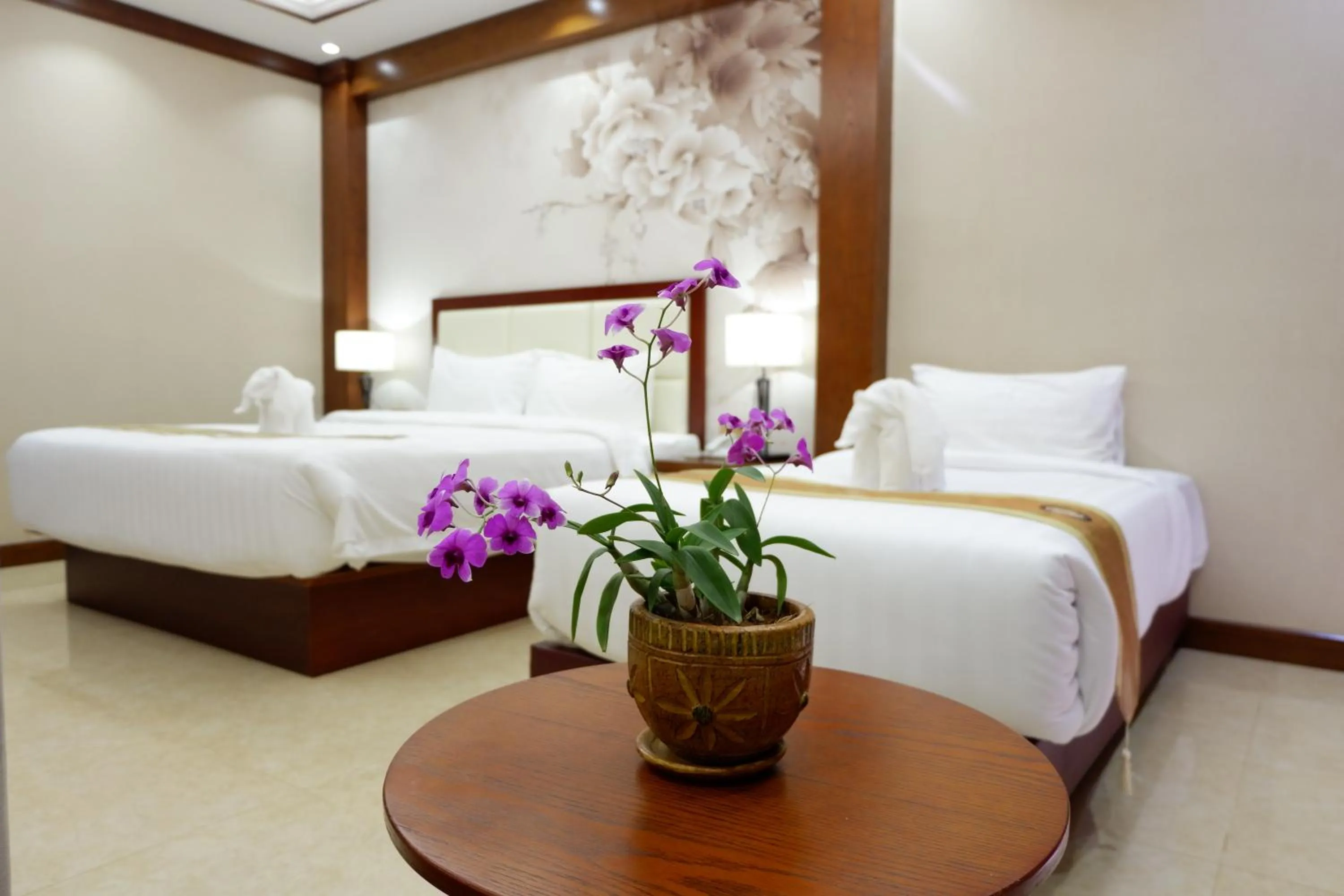 Bed in Paksong Danngarm Hotel