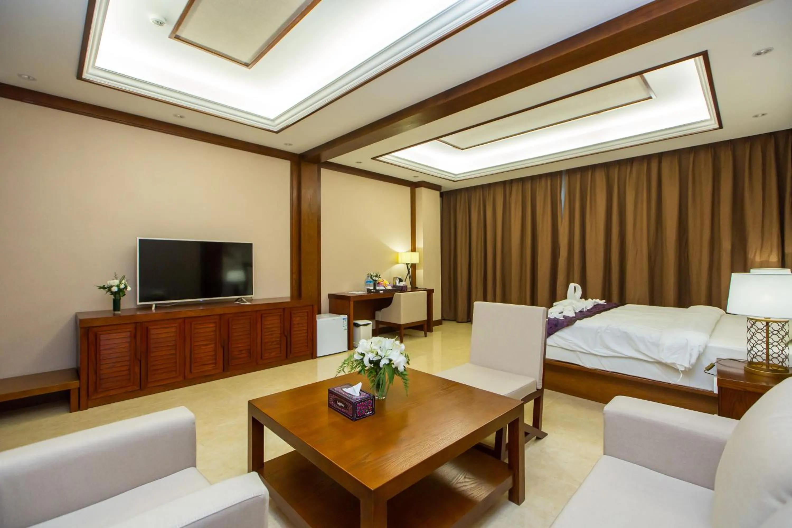 Bed in Paksong Danngarm Hotel